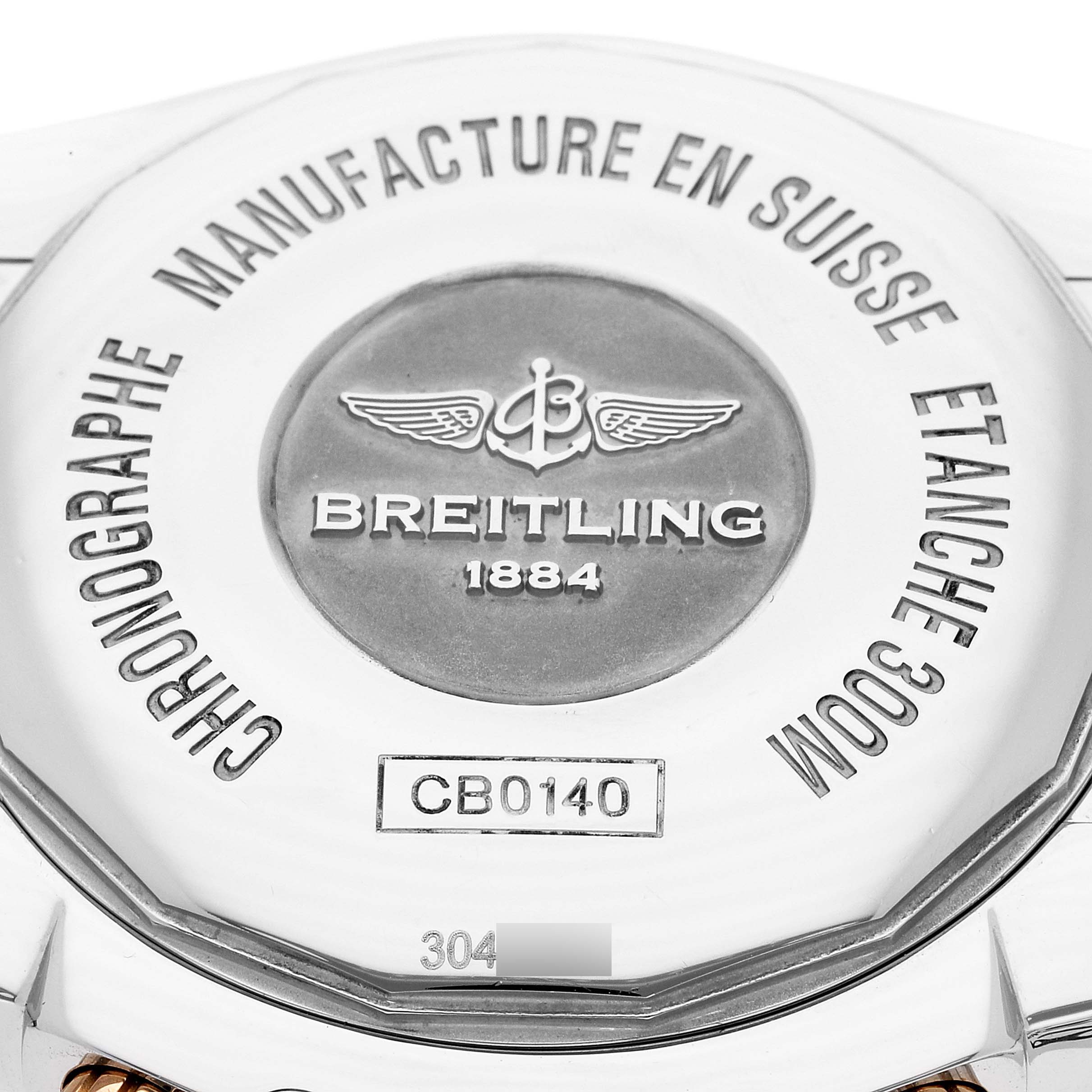 The image shows the back casing of a Breitling Chronomat CB014012/G713 Men's Steel and Gold (two tone) Silver Dial CB014012/G713 Men's Steel and Gold (two tone) Silver Dial watch, featuring the brand name and model information.