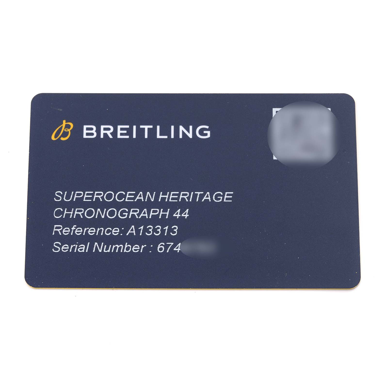 The image shows a warranty card for the Breitling Superocean A13313 Men's Stainless Steel Green Dial A13313 Men's Stainless Steel Green Dial Heritage Chronograph 44, displaying its reference and serial number.