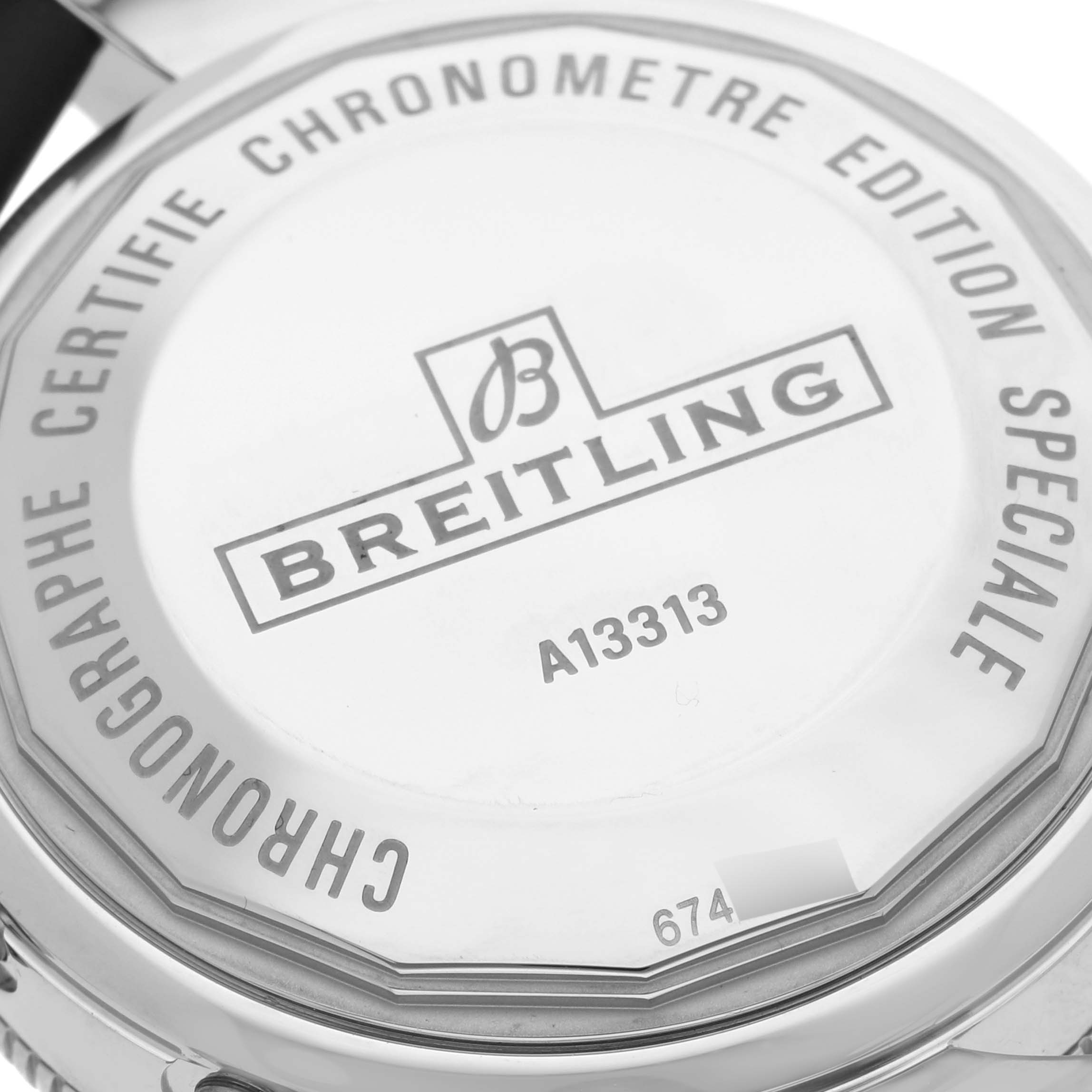 The image shows the case back of the Breitling Superocean A13313 Men's Stainless Steel Green Dial A13313 Men's Stainless Steel Green Dial watch, displaying the brand logo and model details.