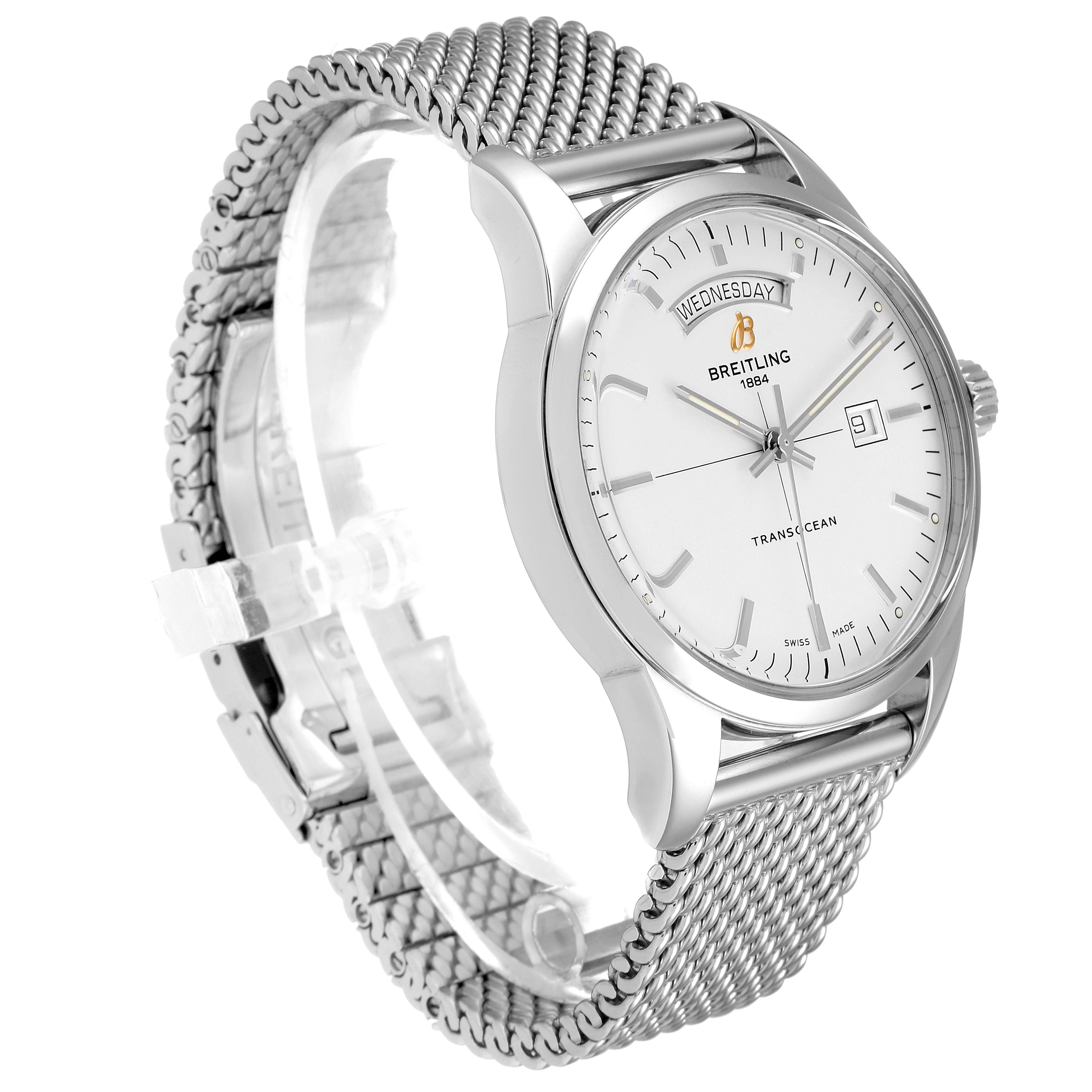 The Breitling Transocean A45310 Men's Stainless Steel Silver Dial A45310 Men's Stainless Steel Silver Dial watch is shown at a slight angle, highlighting its silver mesh strap, round case, and white dial with date and day indicators.