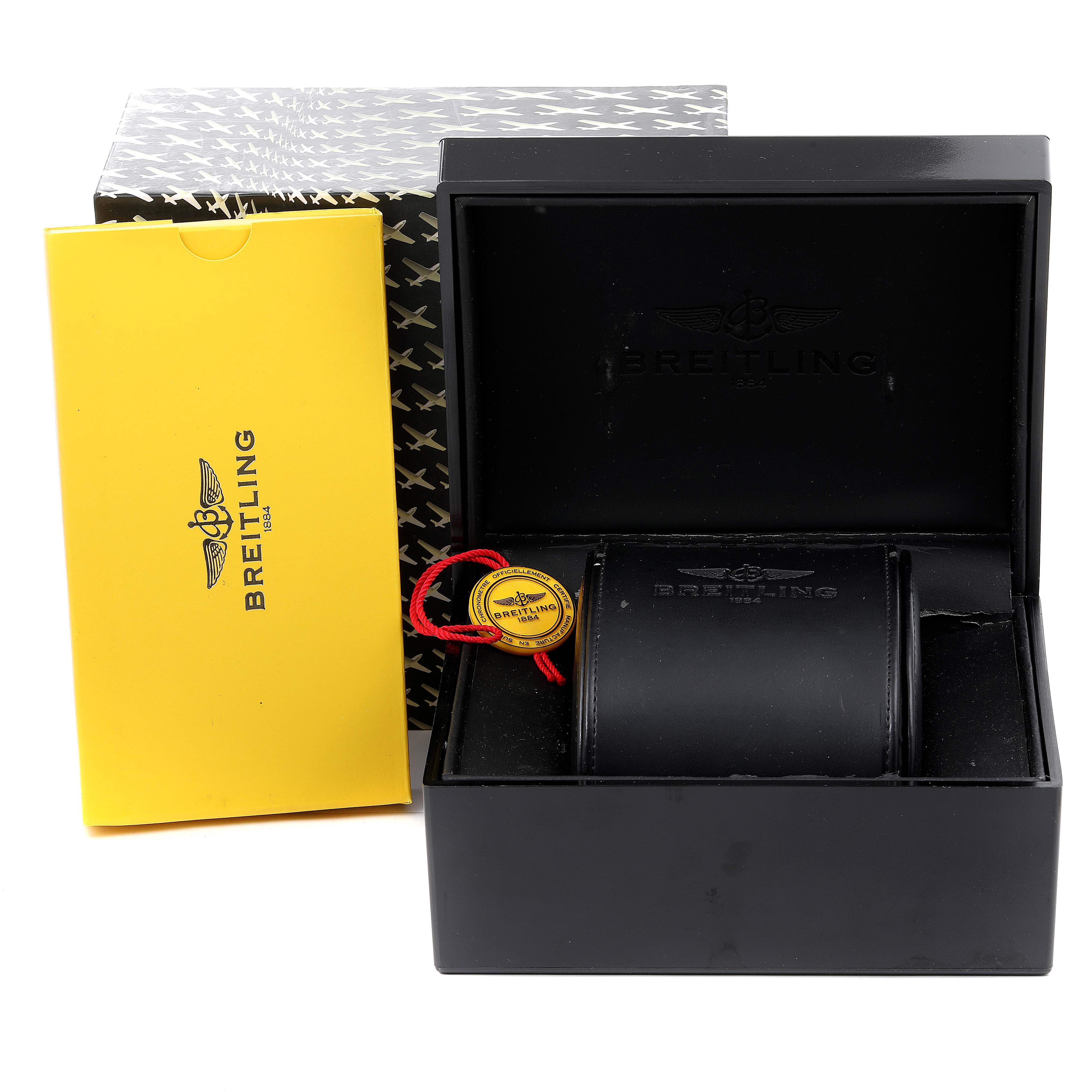 This image shows the packaging, box, and tag for a Breitling Transocean A45310 Men's Stainless Steel Silver Dial A45310 Men's Stainless Steel Silver Dial watch.