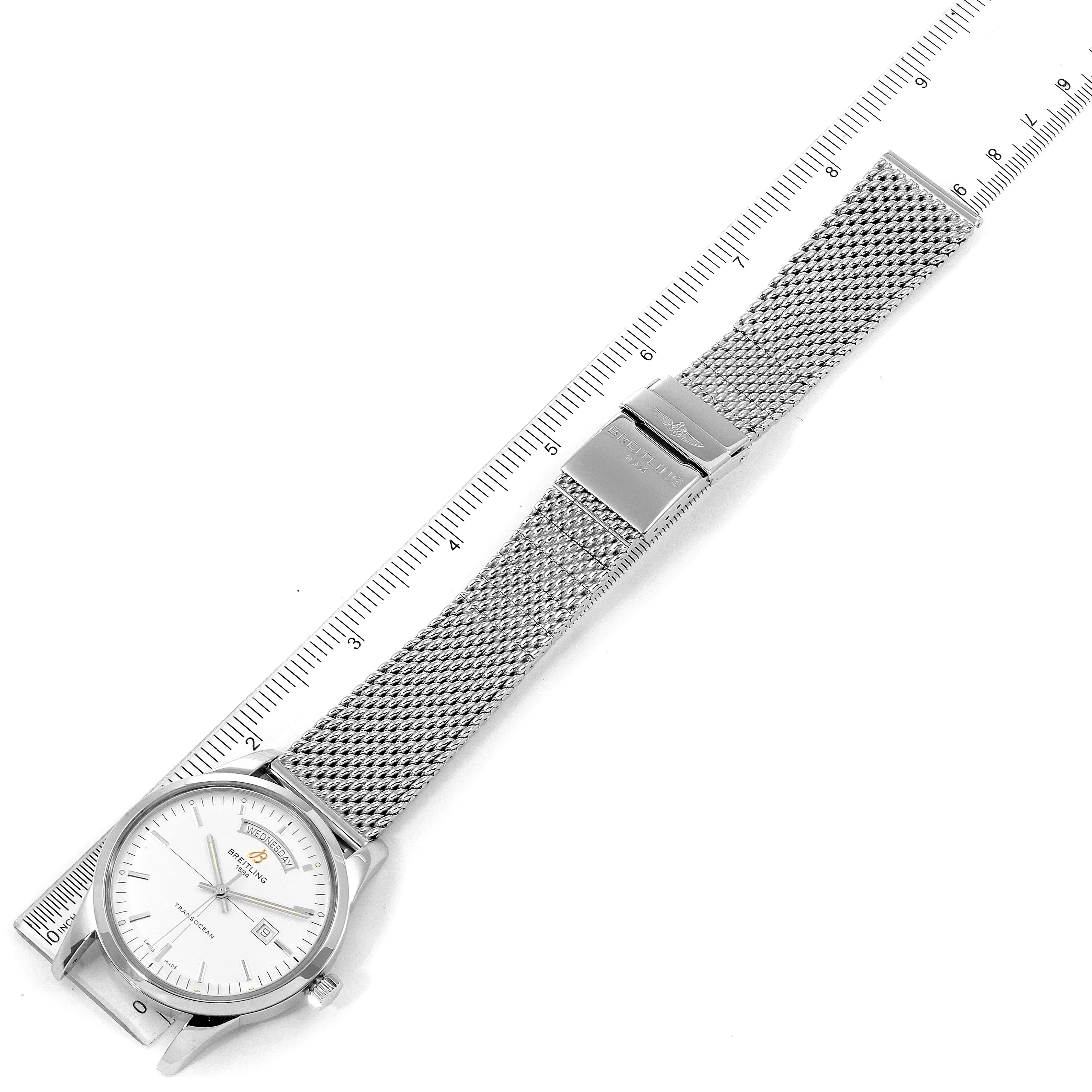 The Breitling Transocean A45310 Men's Stainless Steel Silver Dial A45310 Men's Stainless Steel Silver Dial watch is shown from a top-down angle, displaying the face, stainless steel mesh band, and deployment clasp.