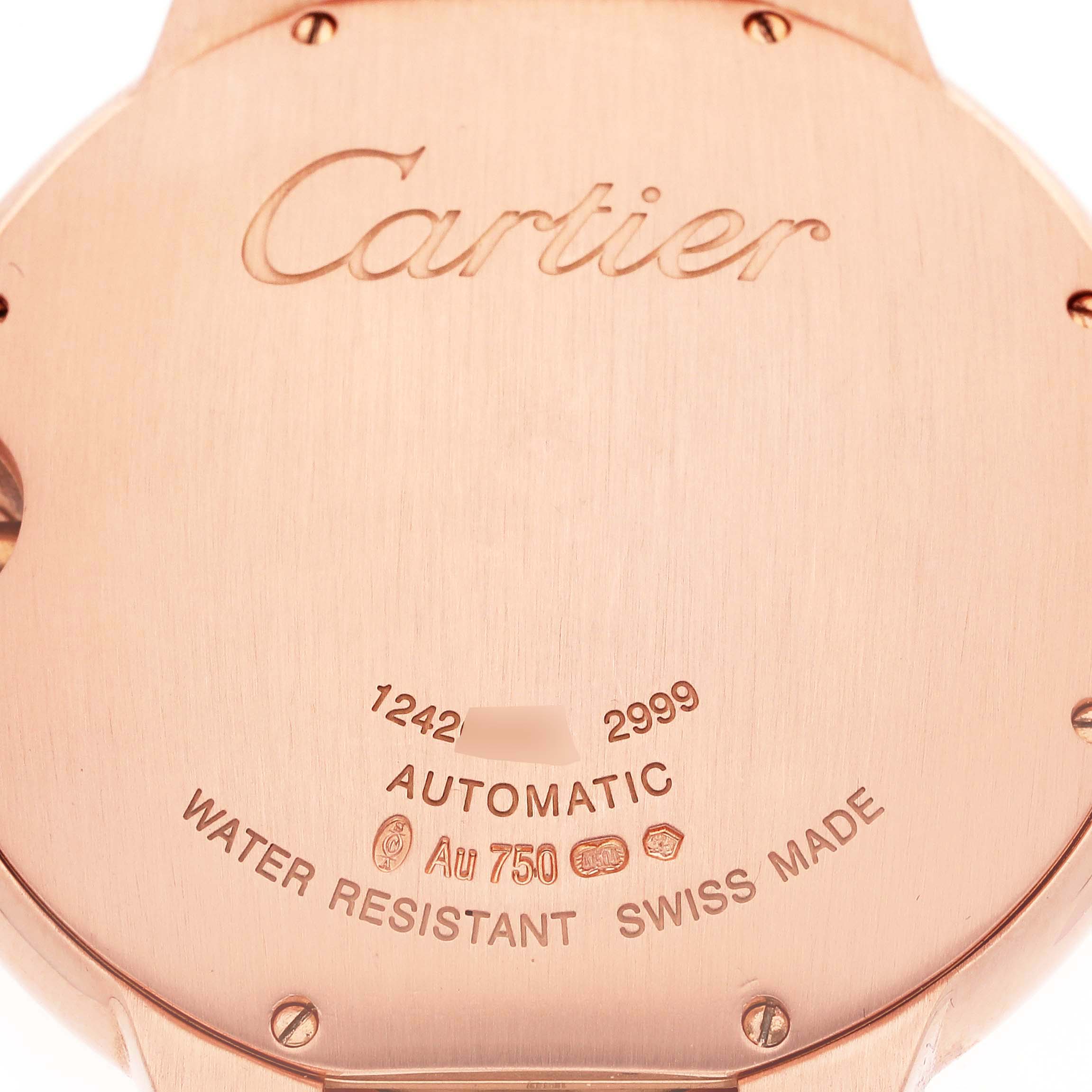 This image shows the back of the Cartier Ballon Bleu WE9008Z3 Men's Rose Gold Silver Dial WE9008Z3 Men's Rose Gold Silver Dial model, highlighting the inscriptions and details like serial number and material.