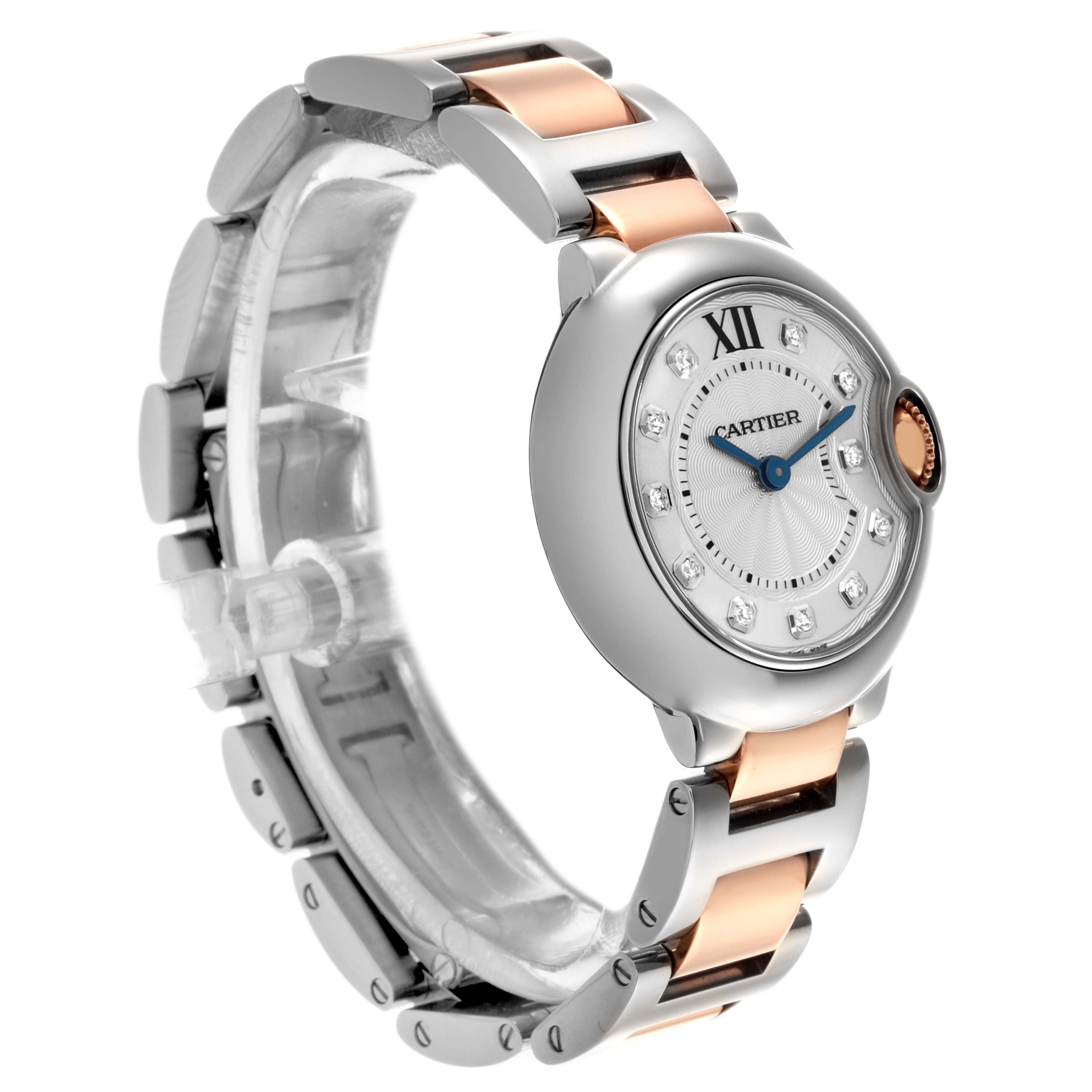 The Cartier Ballon Bleu WE902030 Women
s Steel and Gold (two tone) Silver Dial WE902030 Women
s Steel and Gold (two tone) Silver Dial watch is shown at an angle highlighting the face, crown, and metal strap.
