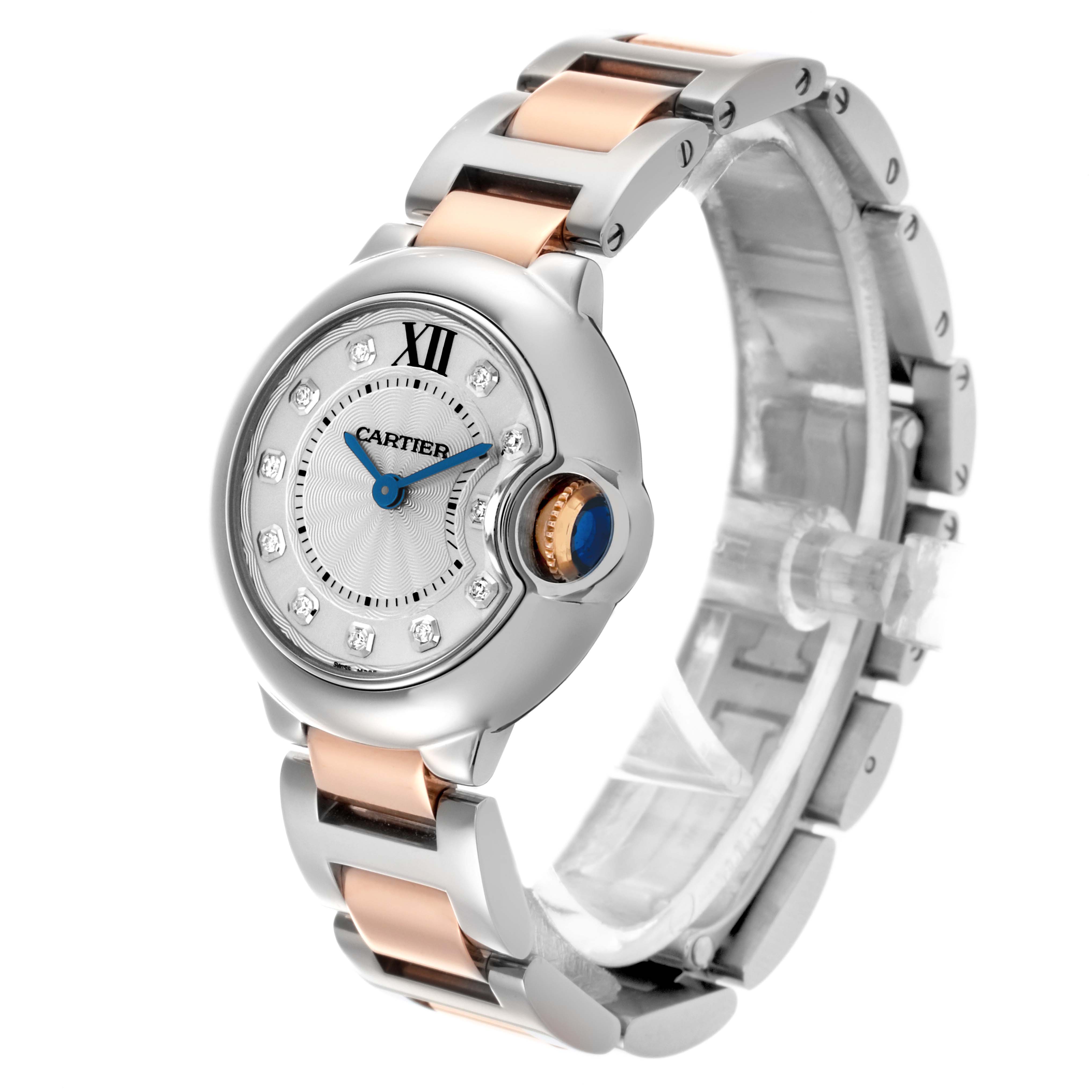The Cartier Ballon Bleu WE902030 Women
s Steel and Gold (two tone) Silver Dial WE902030 Women
s Steel and Gold (two tone) Silver Dial watch is shown at a three-quarter angle, highlighting its face, case, bracelet, and crown detail.