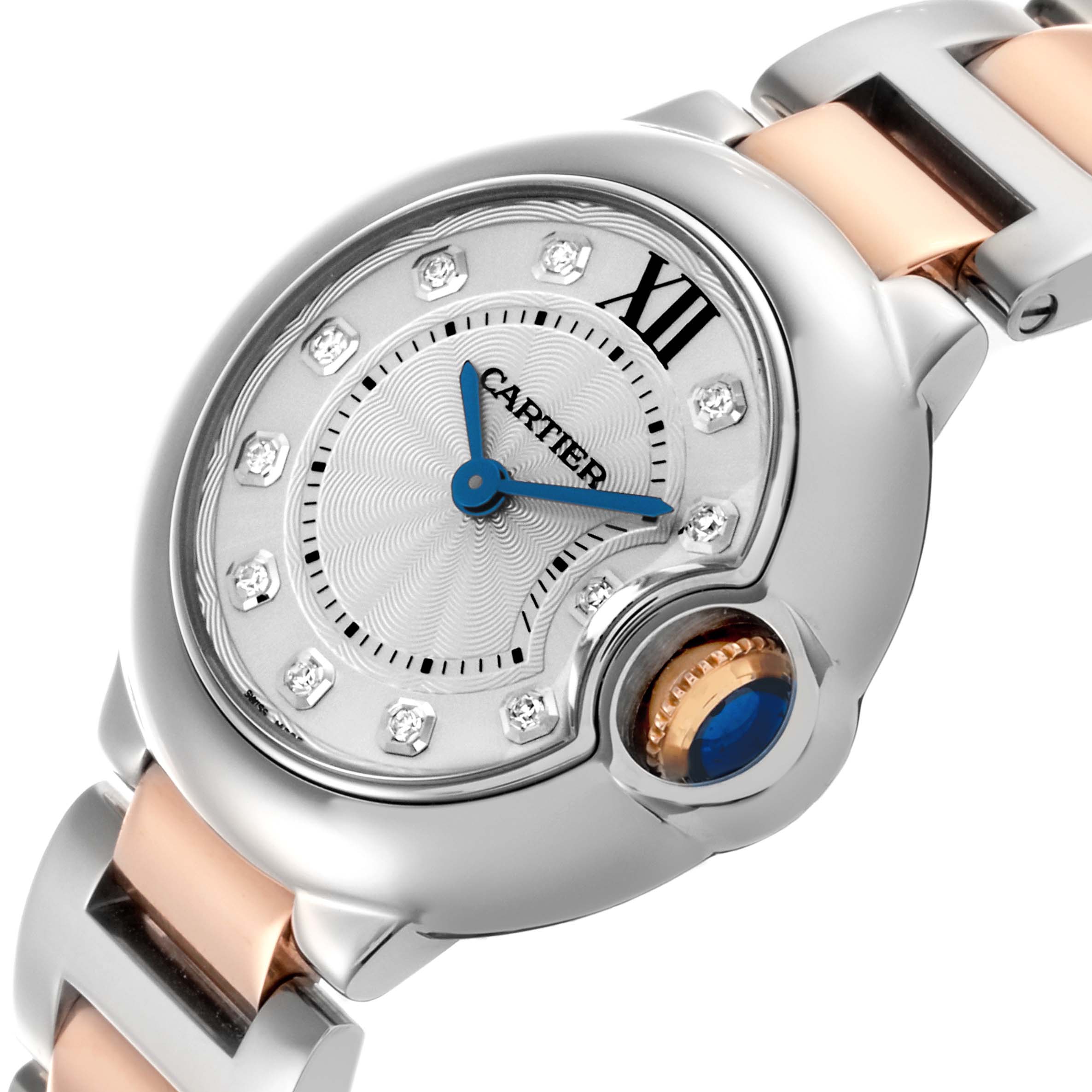 The Cartier Ballon Bleu WE902030 Women
s Steel and Gold (two tone) Silver Dial WE902030 Women
s Steel and Gold (two tone) Silver Dial watch is shown at a slight angle, featuring its dial, blue hands, crown, and part of the metal bracelet.