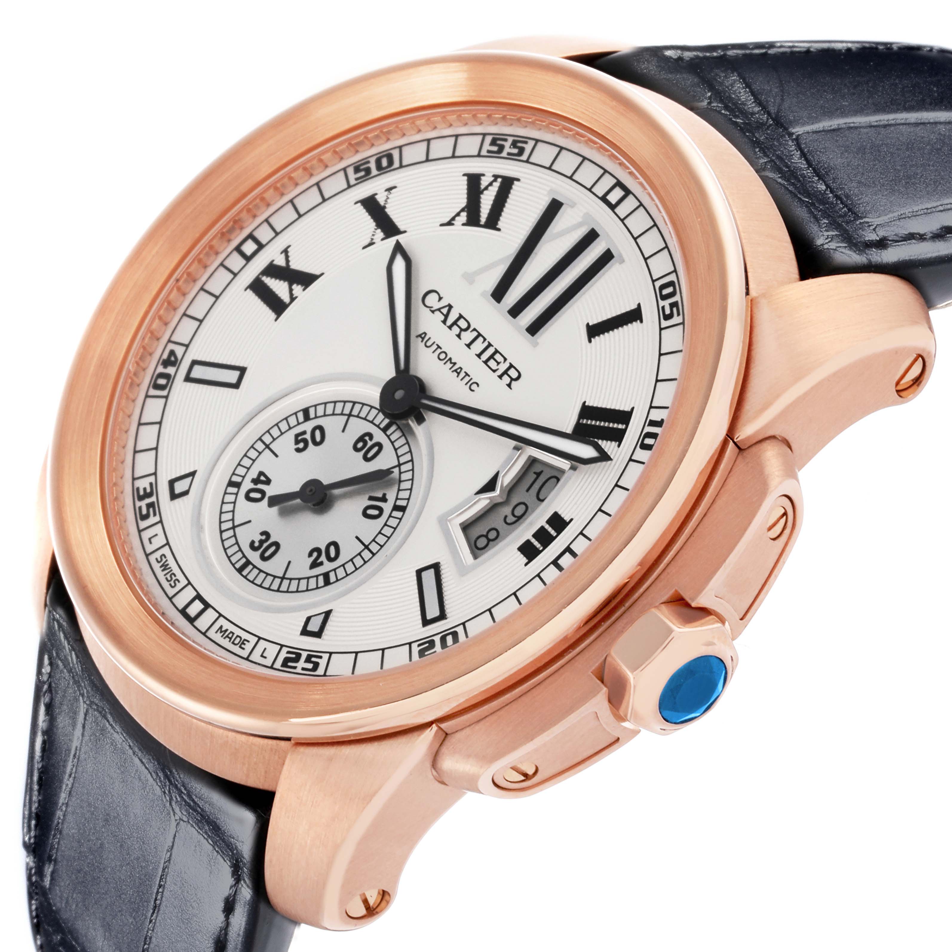 The image shows a Calibre de Cartier model watch by Cartier at an angled view, highlighting its face, case, crown, and strap.