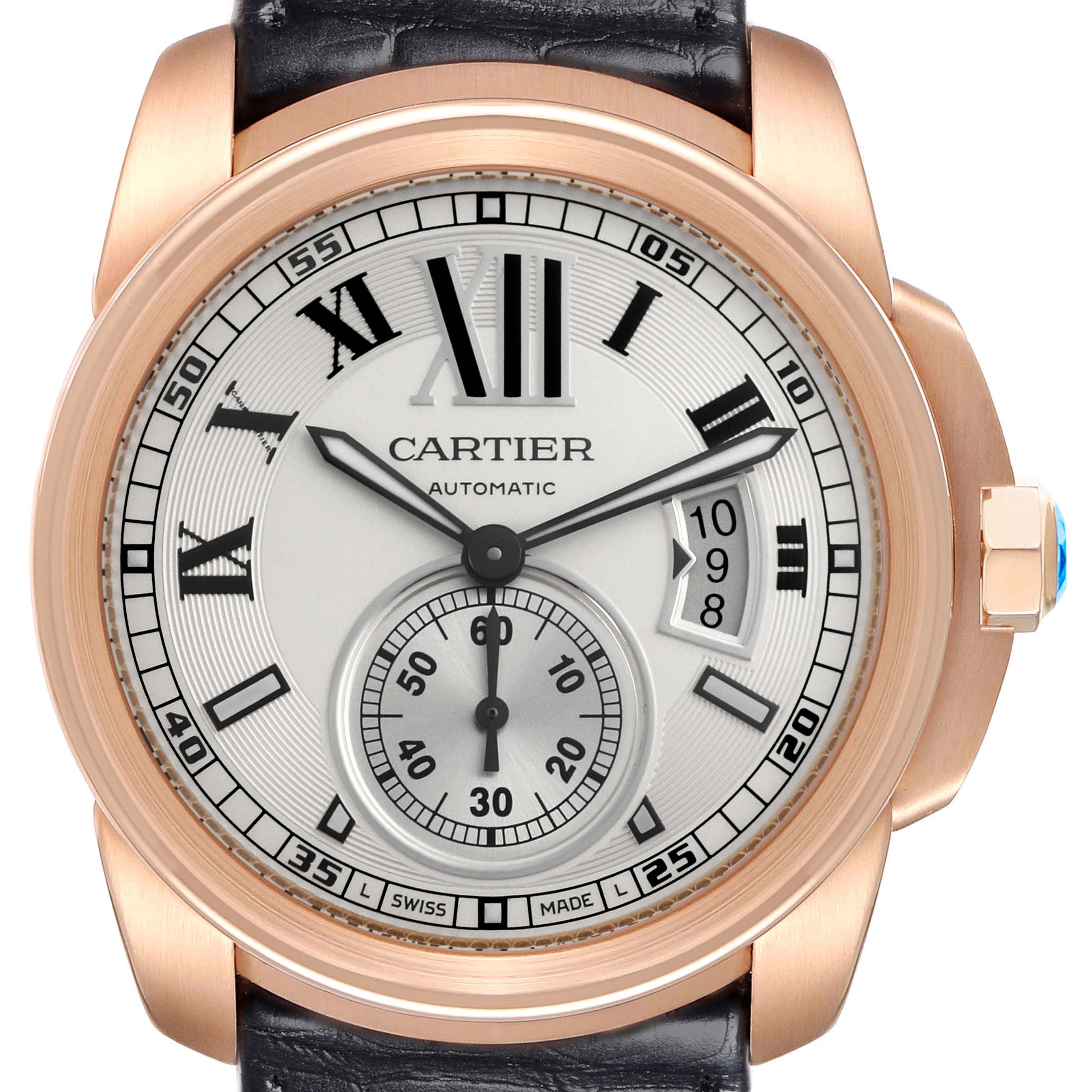 The image shows a Calibre de Cartier watch from the front, highlighting its dial, Roman numerals, sub-dial, and date window.