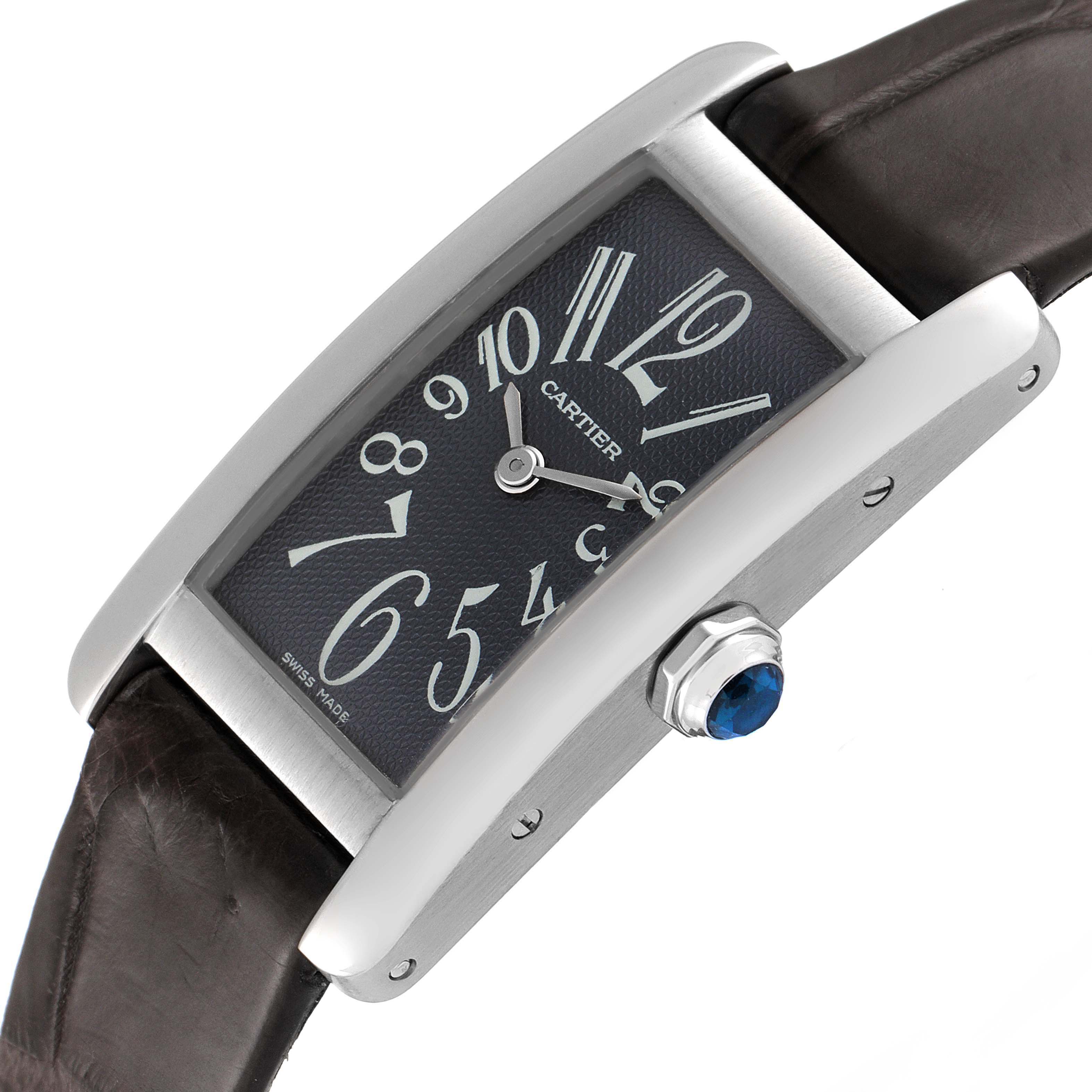 The image shows a side view of the Cartier Tank Americaine W2605129 Women's White Gold Grey Dial W2605129 Women's White Gold Grey Dial watch, highlighting the face, case, crown, and leather strap.