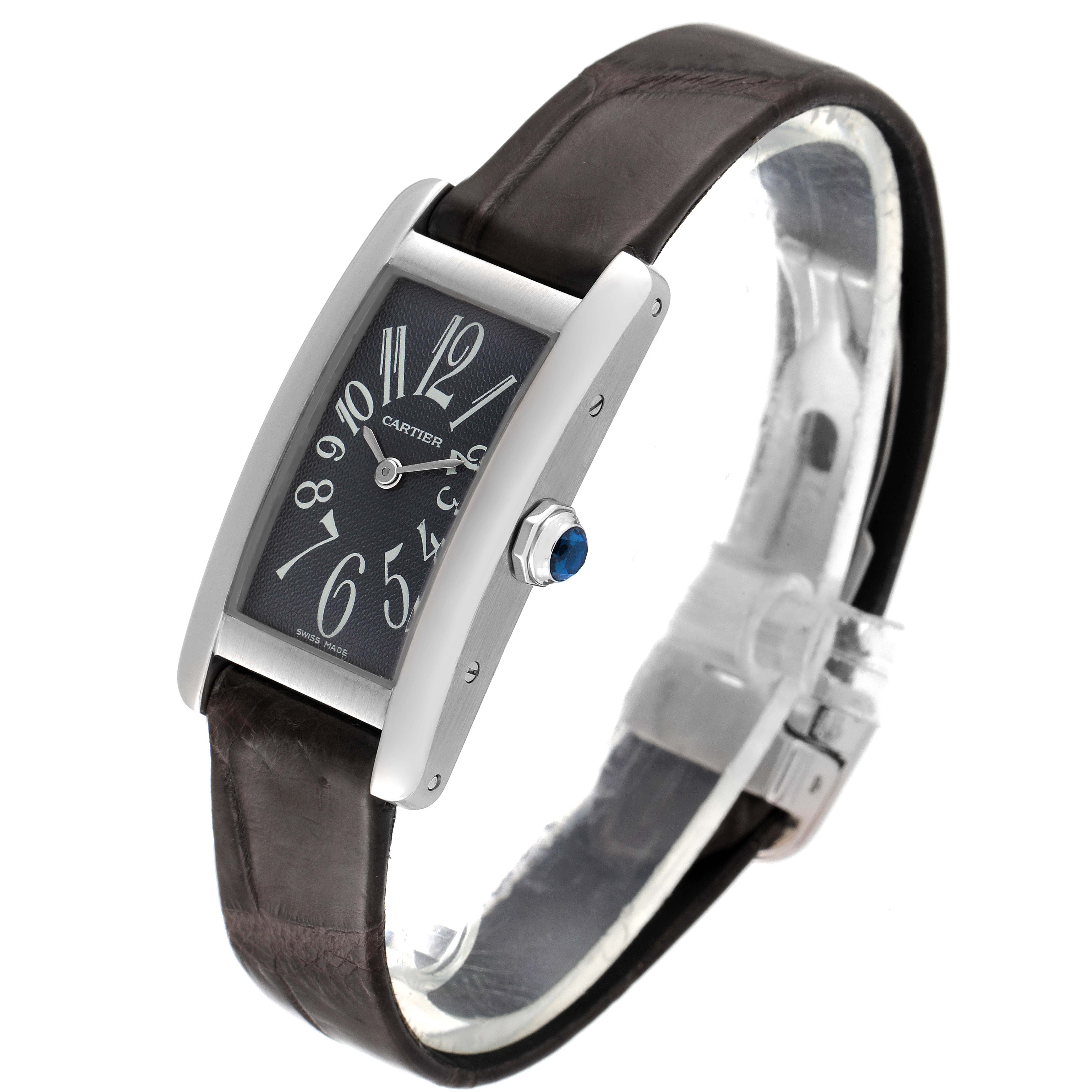 This is a Tank Americaine watch by Cartier, shown at an angled view highlighting the face, crown, and strap.