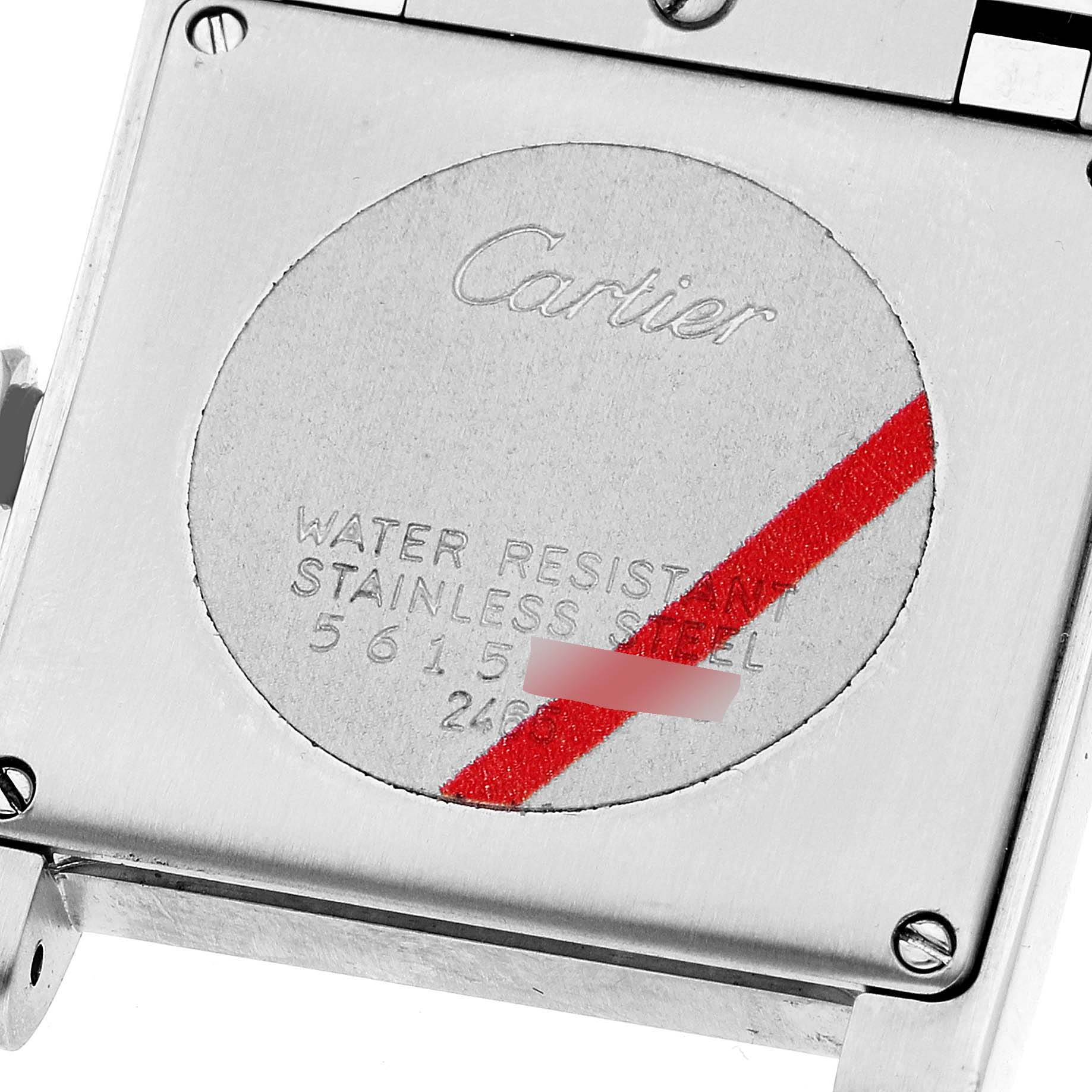 This image shows the back of the Cartier Tank Francaise W51011Q3 Women's Stainless Steel Silver Dial W51011Q3 Women's Stainless Steel Silver Dial watch focusing on the case and engravings.