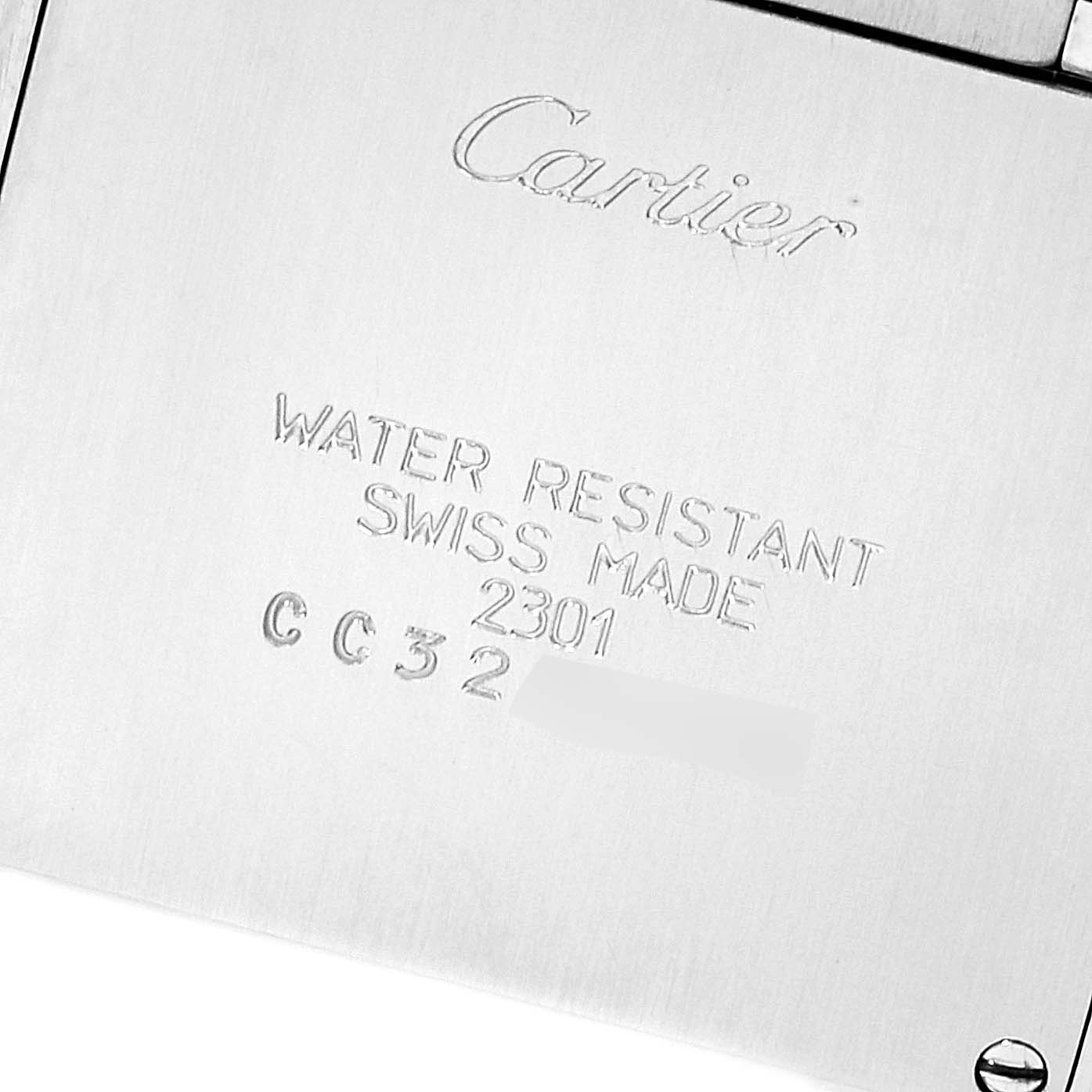 This image shows the case back of a Cartier Tank Française watch, displaying engravings and water resistance markings.