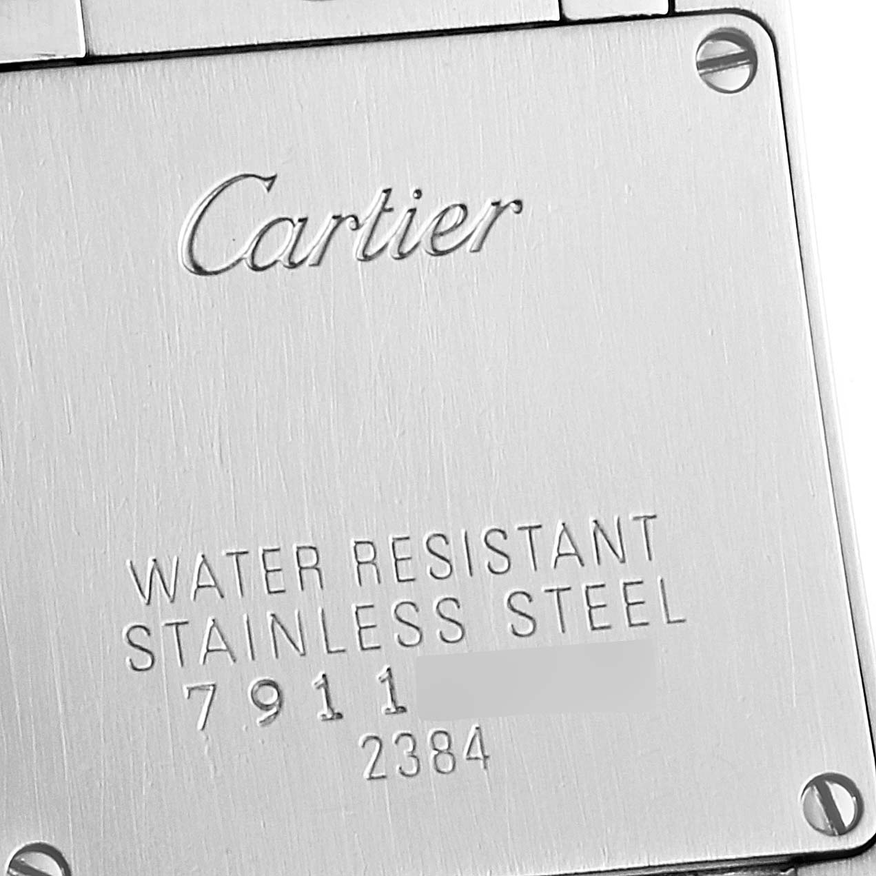 Shown is the back plate of a Cartier Tank Francaise W51007Q4 Women's Steel and Gold (two tone) Silver Dial W51007Q4 Women's Steel and Gold (two tone) Silver Dial watch, displaying the brand name and water resistance details.