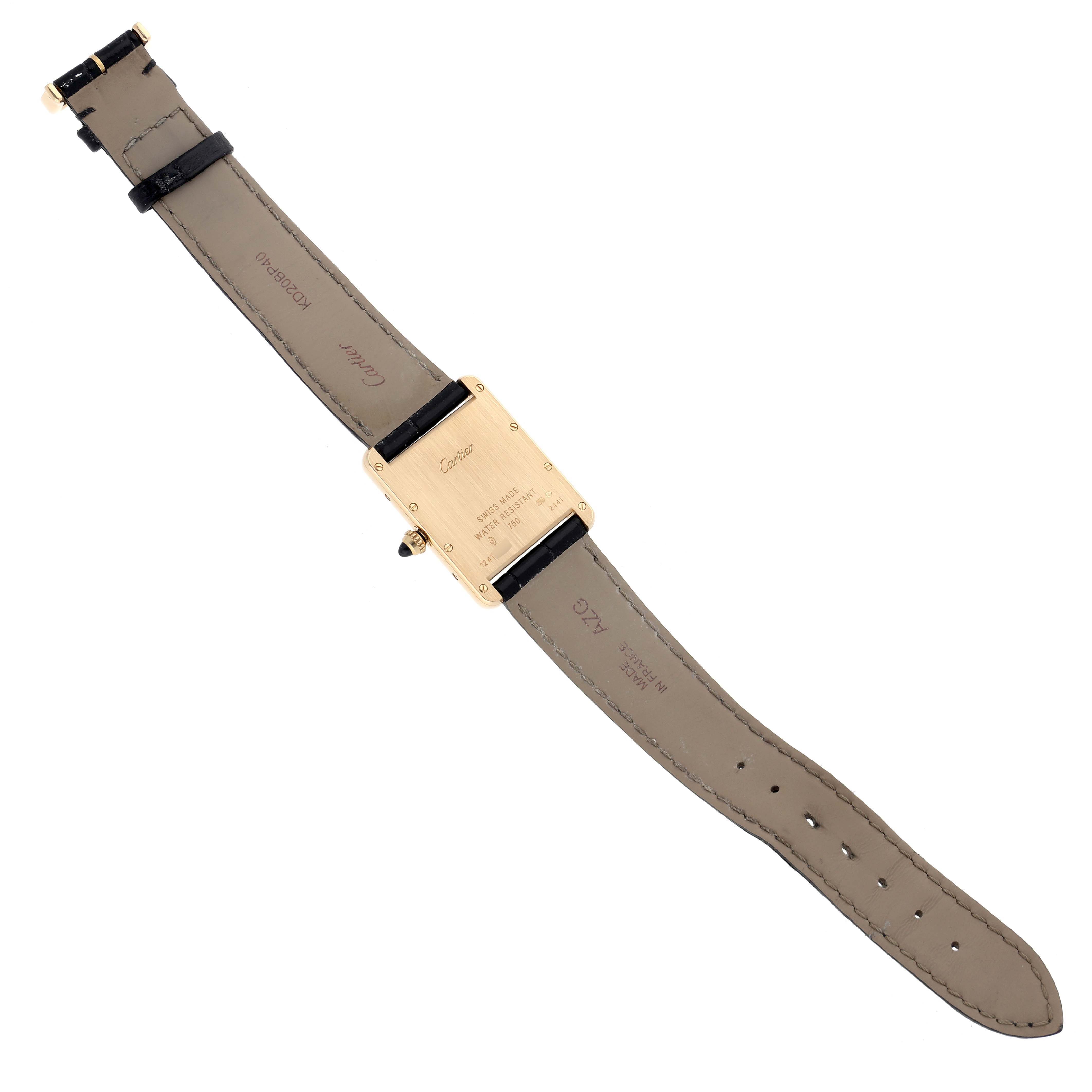 The Cartier Tank Louis W1529756 Men's Yellow Gold Silver Dial W1529756 Men's Yellow Gold Silver Dial model is shown from the back, displaying the case, straps, and buckle.