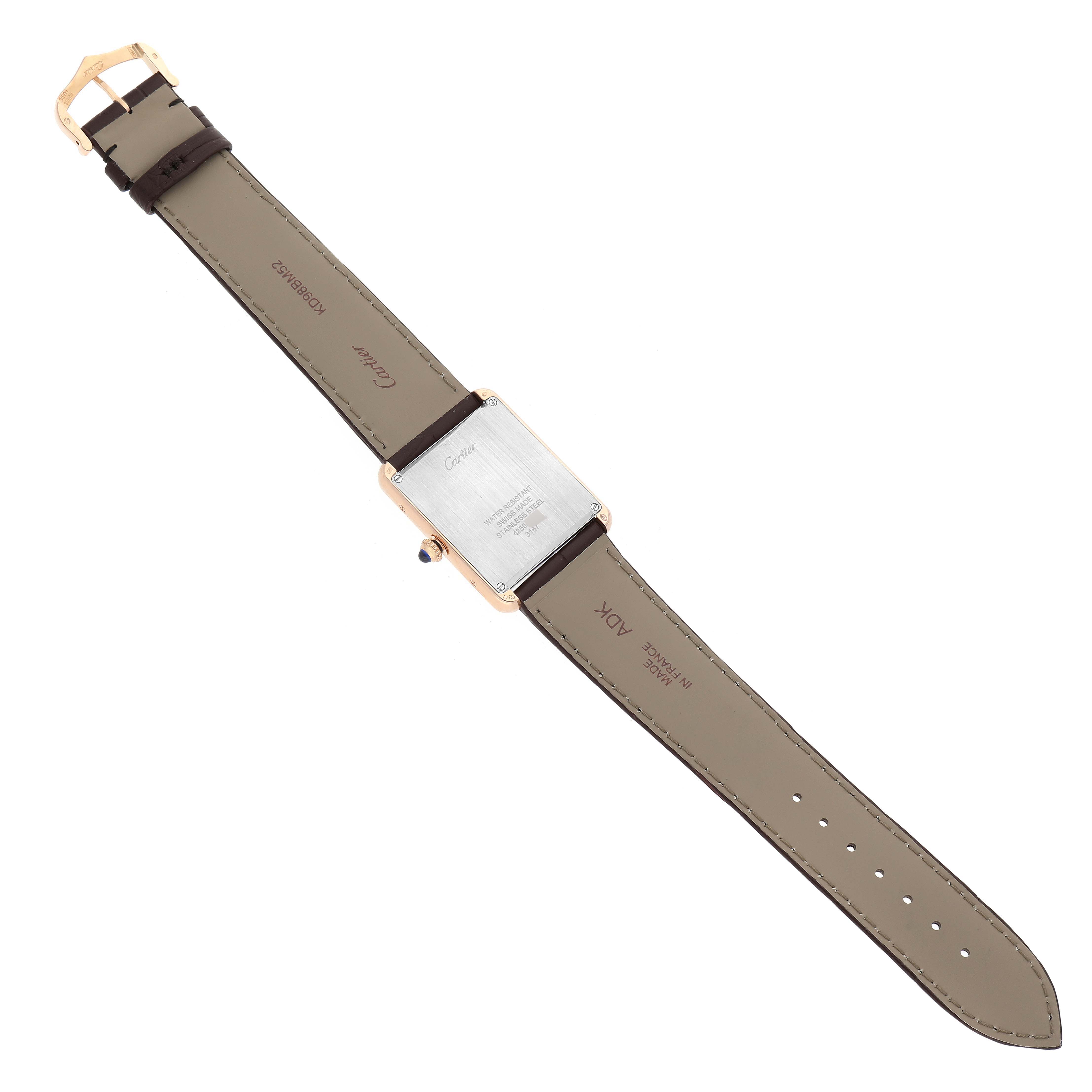 The image shows the back view of a Cartier Tank Solo W5200025 Men
s Steel and Gold (two tone) Silver Dial W5200025 Men
s Steel and Gold (two tone) Silver Dial watch, highlighting the strap and case back.