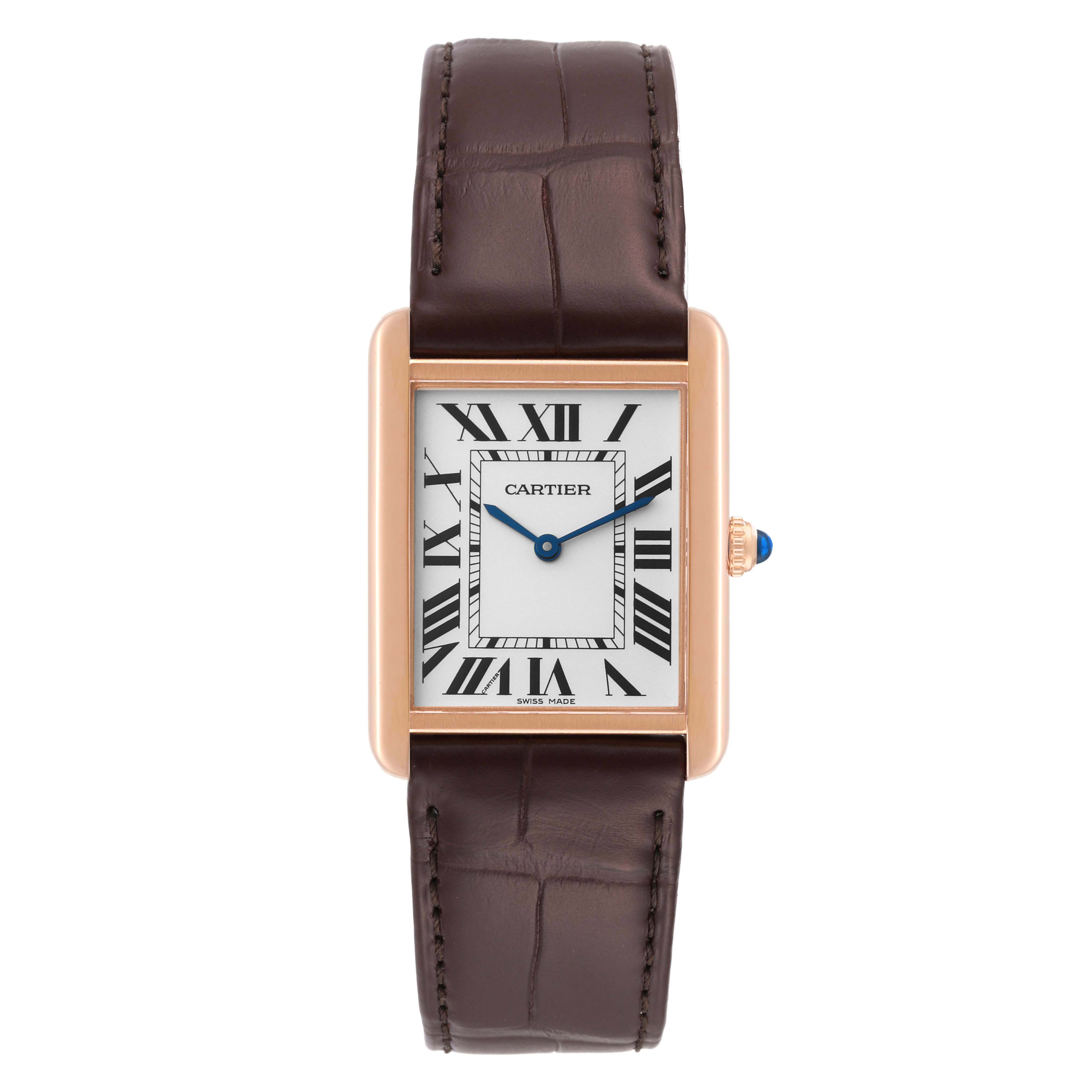 The image shows a Cartier Tank Solo W5200025 Men
s Steel and Gold (two tone) Silver Dial W5200025 Men
s Steel and Gold (two tone) Silver Dial watch from a front angle, highlighting its face, Roman numerals, blue hands, and brown leather strap.