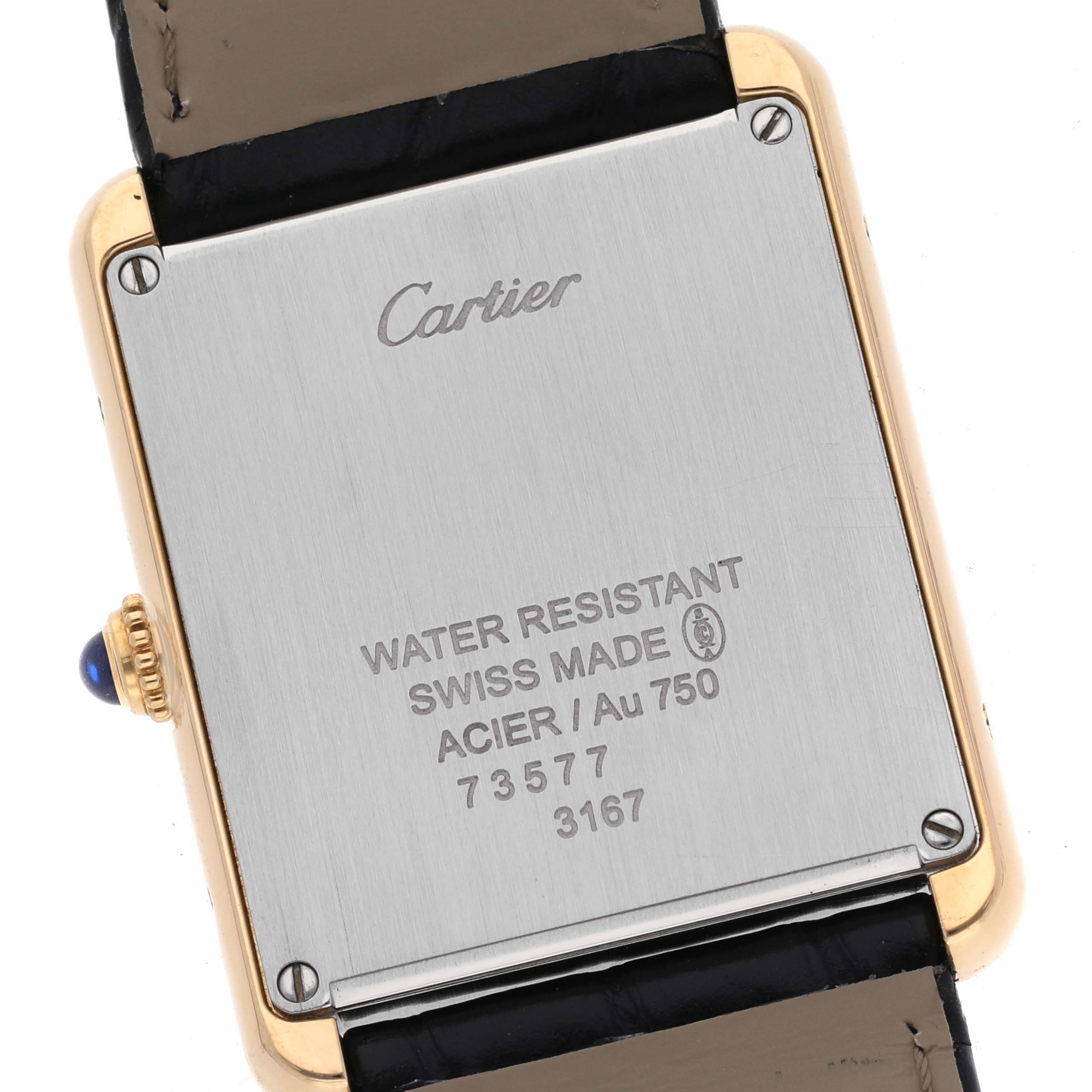The image shows the back case of a Cartier Tank Solo W5200004 Men
s Steel and Gold (two tone) Silver Dial W5200004 Men
s Steel and Gold (two tone) Silver Dial watch, including the Cartier logo, model details, and water resistance information.