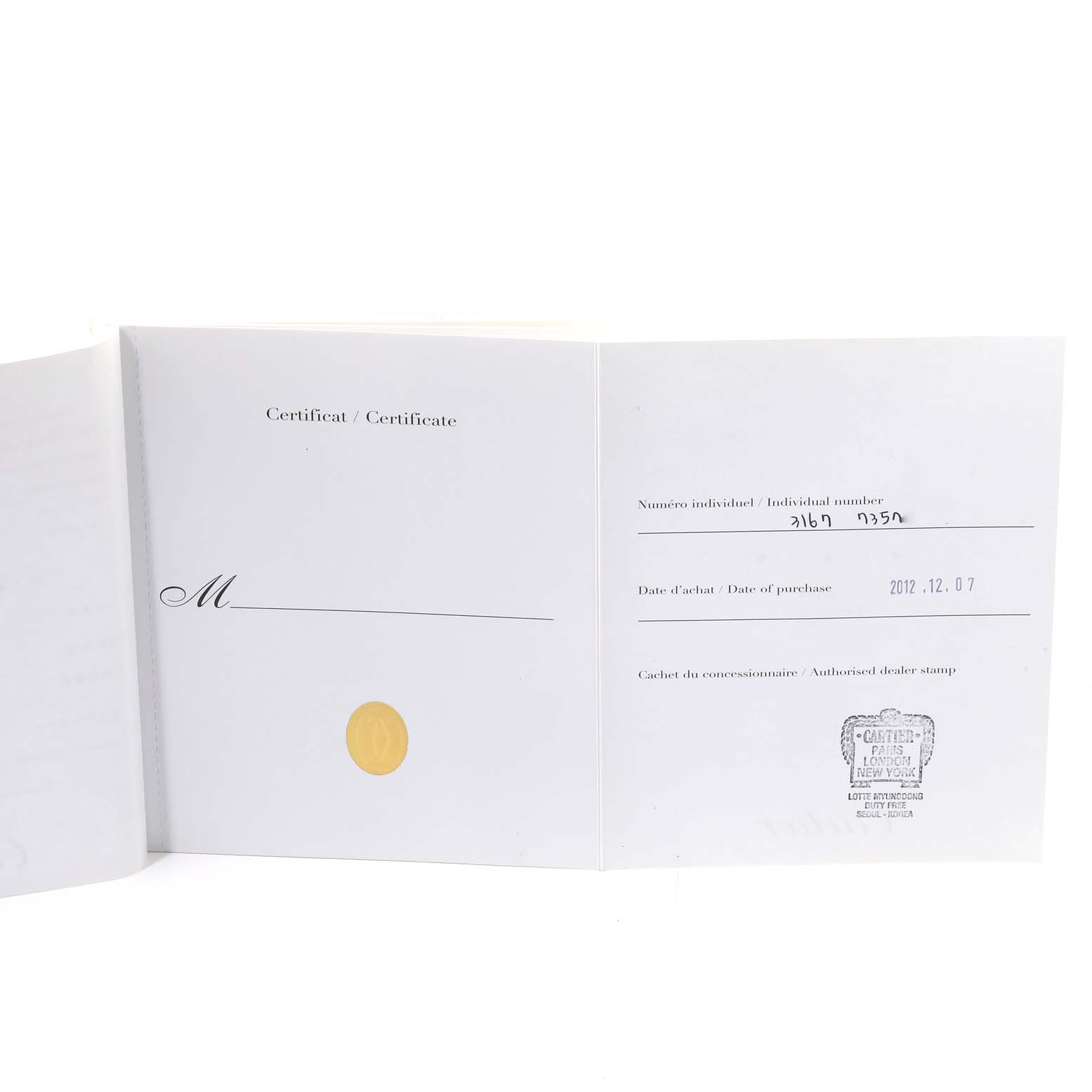 The image shows the certificate and warranty booklet for the Cartier Tank Solo W5200004 Men
s Steel and Gold (two tone) Silver Dial W5200004 Men
s Steel and Gold (two tone) Silver Dial watch, open to display its inner pages.
