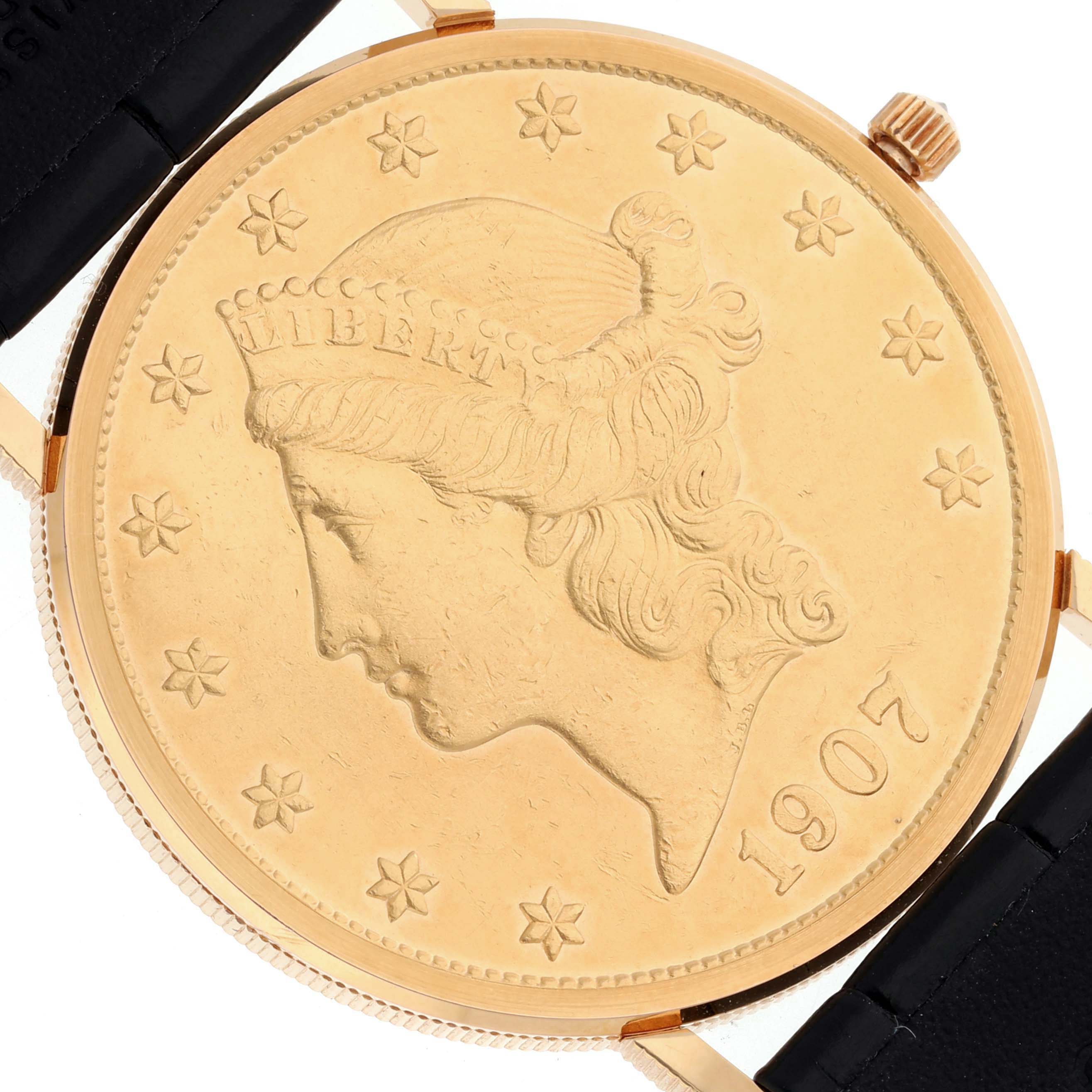 The image shows the back of the Corum Coin Watch 1907 Men's Yellow Gold Champagne Dial 1907 Men's Yellow Gold Champagne Dial model, depicting a coin with the year 1907.