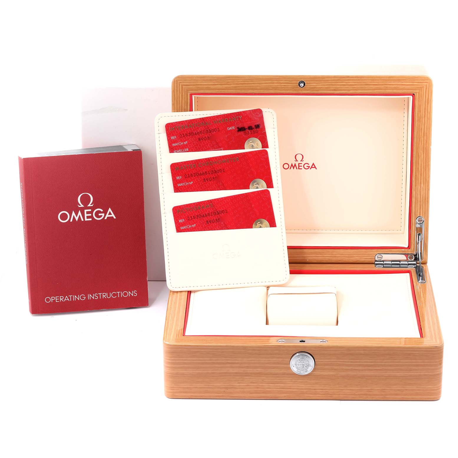 The image shows a Planet Ocean model by Omega with its wooden box, operating instructions, and warranty cards.