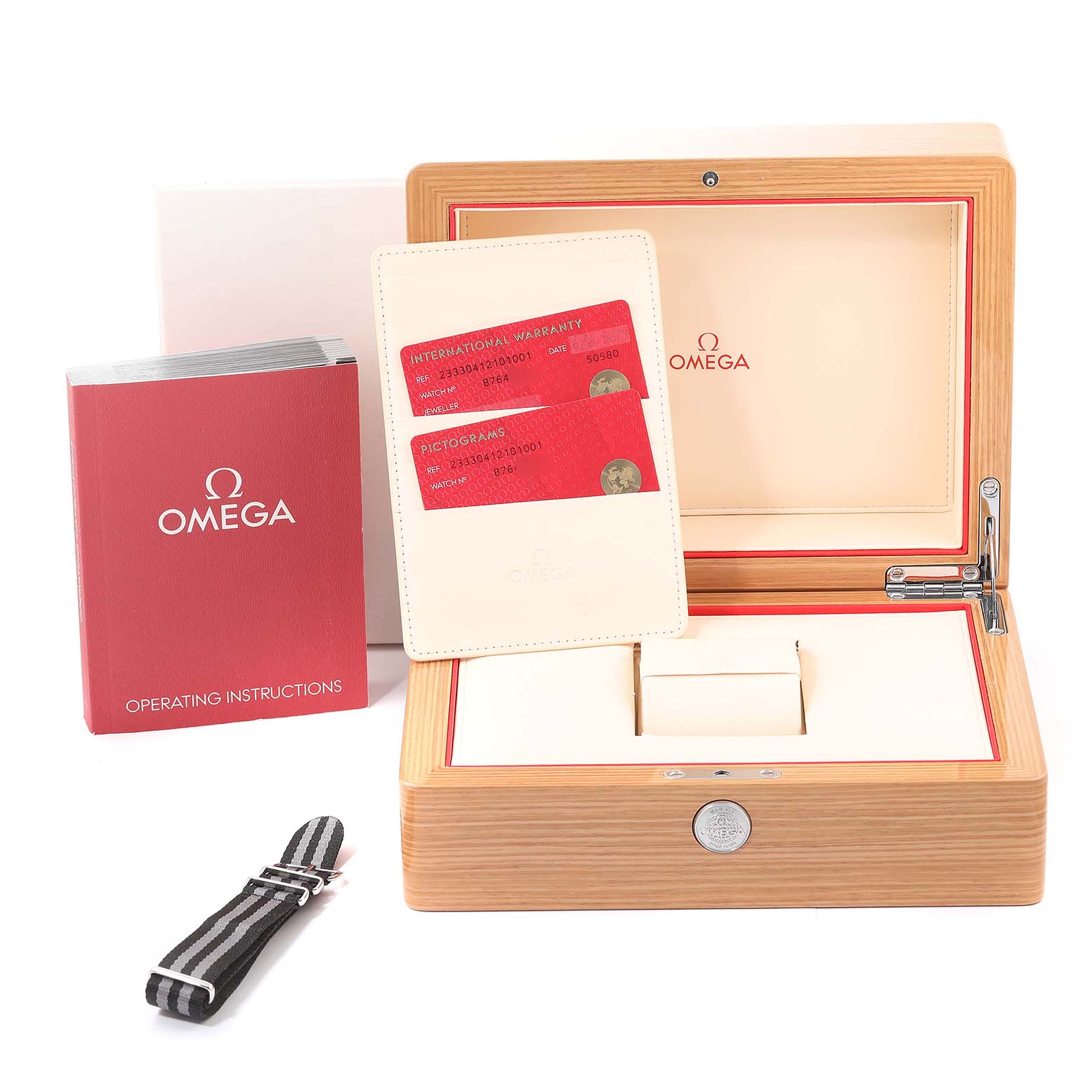 The image shows an Omega Seamaster 233.30.41.21.01.001 Men's Stainless Steel Black Dial 233.30.41.21.01.001 Men's Stainless Steel Black Dial watch box, warranty cards, operating instructions, and a fabric strap.