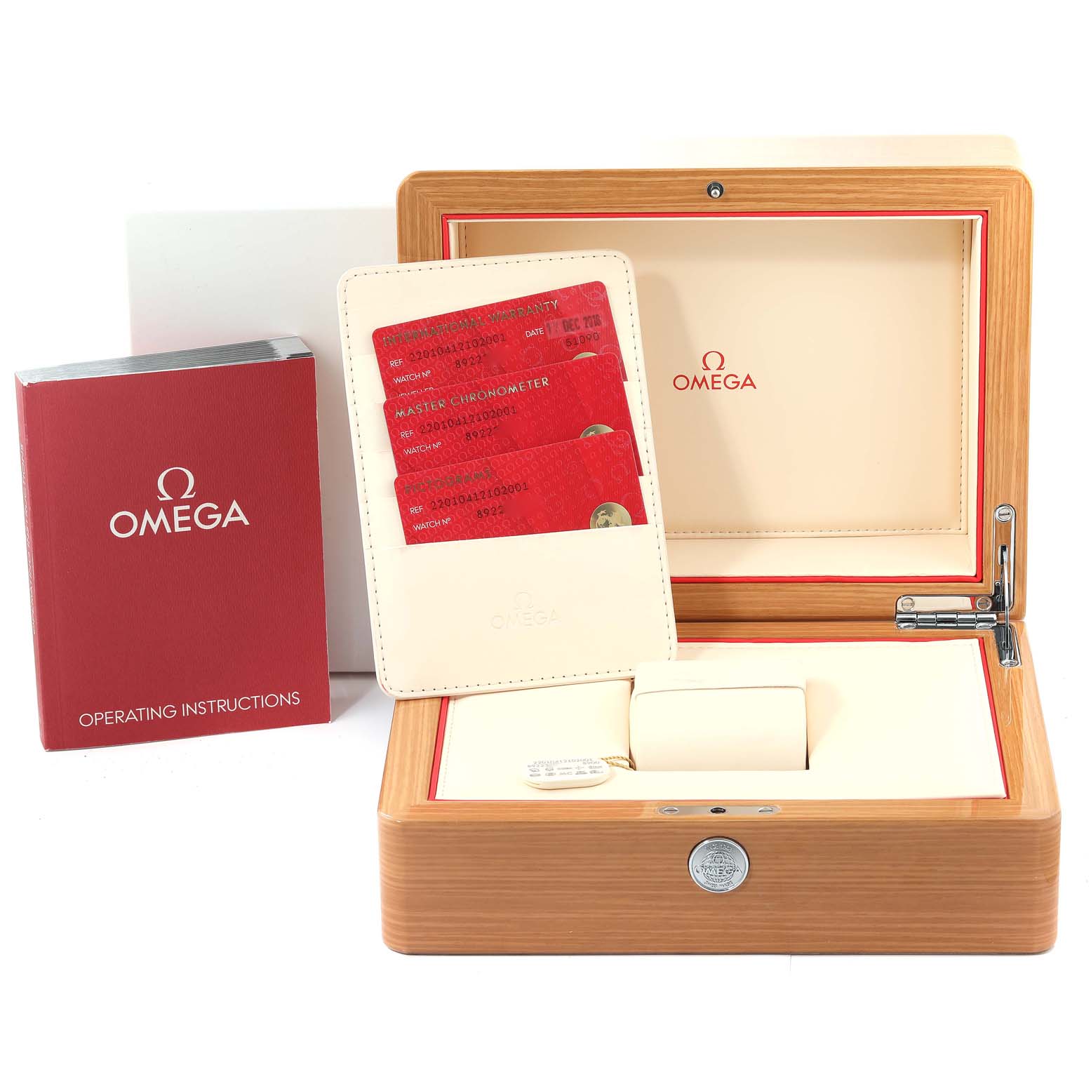 This image showcases the packaging, operating instructions, and warranty cards for an Omega Aqua Terra 220.10.41.21.02.001 Men's Stainless Steel Silver Dial 220.10.41.21.02.001 Men's Stainless Steel Silver Dial watch.