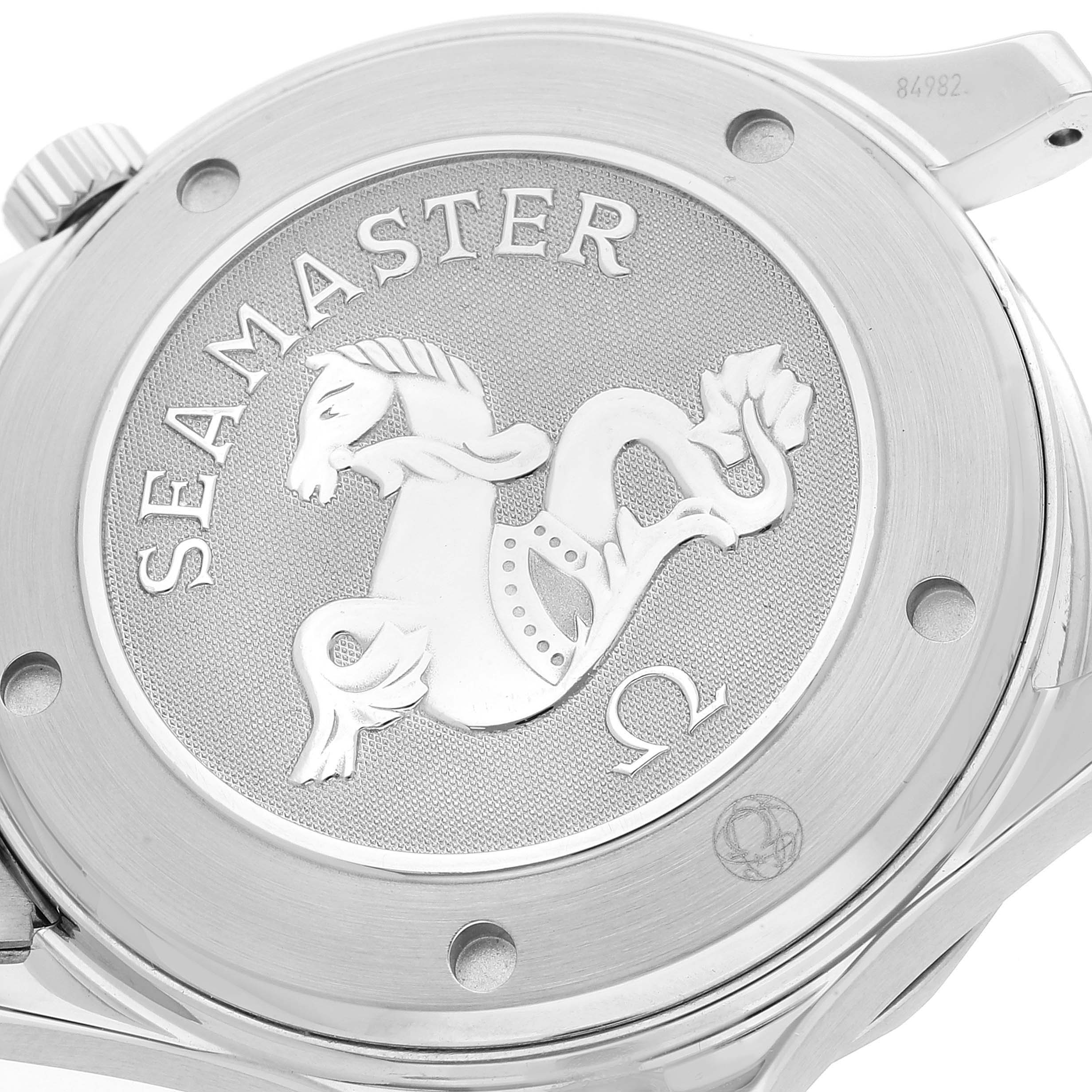 This is an angled close-up view of the case back of an Omega Seamaster 212.30.41.20.01.002 Men's Stainless Steel Black Dial 212.30.41.20.01.002 Men's Stainless Steel Black Dial watch, showcasing the engraved logo and text.