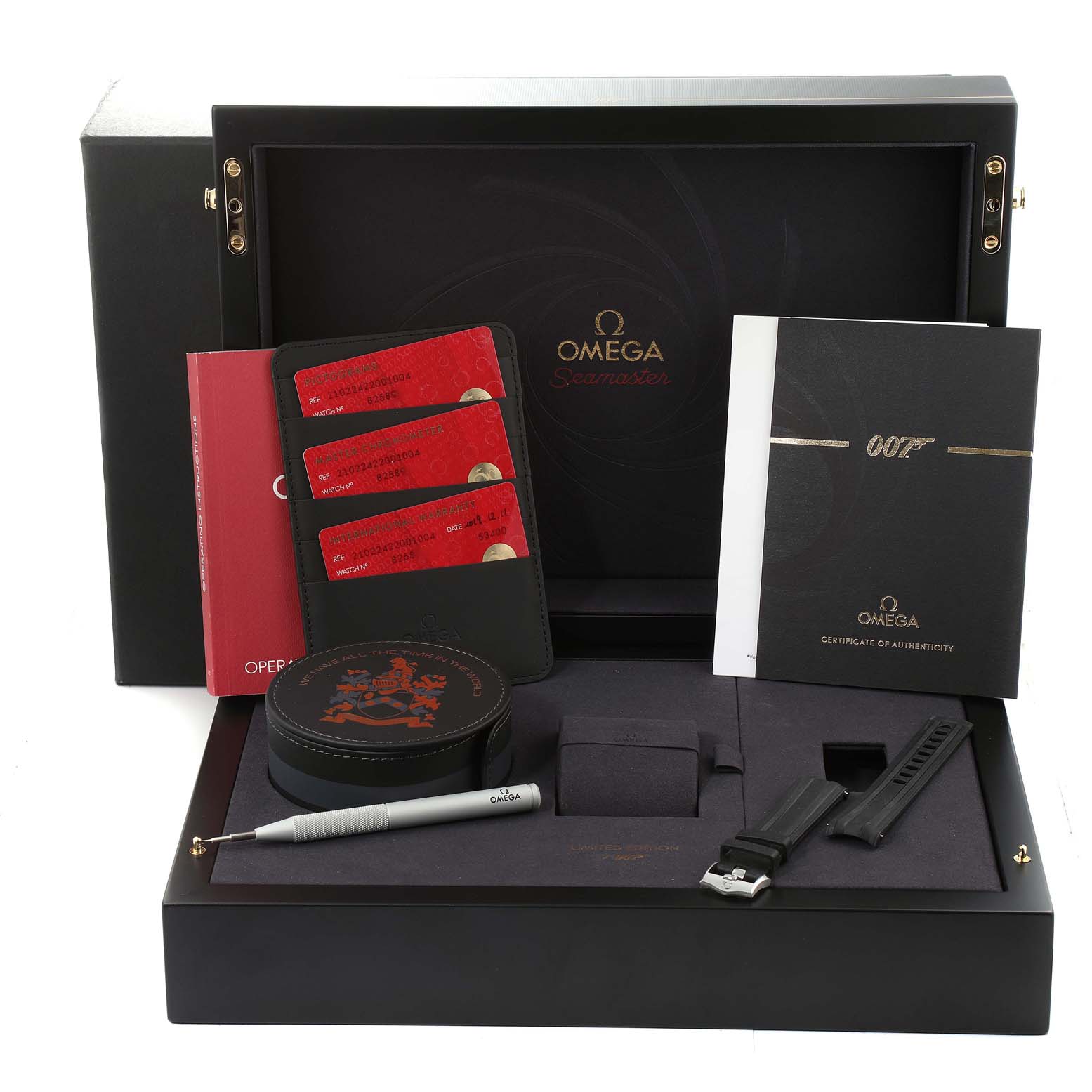 The image shows a complete set of Omega Seamaster 210.22.42.20.01.004 Men's Stainless Steel Black Dial 210.22.42.20.01.004 Men's Stainless Steel Black Dial watch accessories, including manuals, cards, straps, and tools, all from a top-down angle.