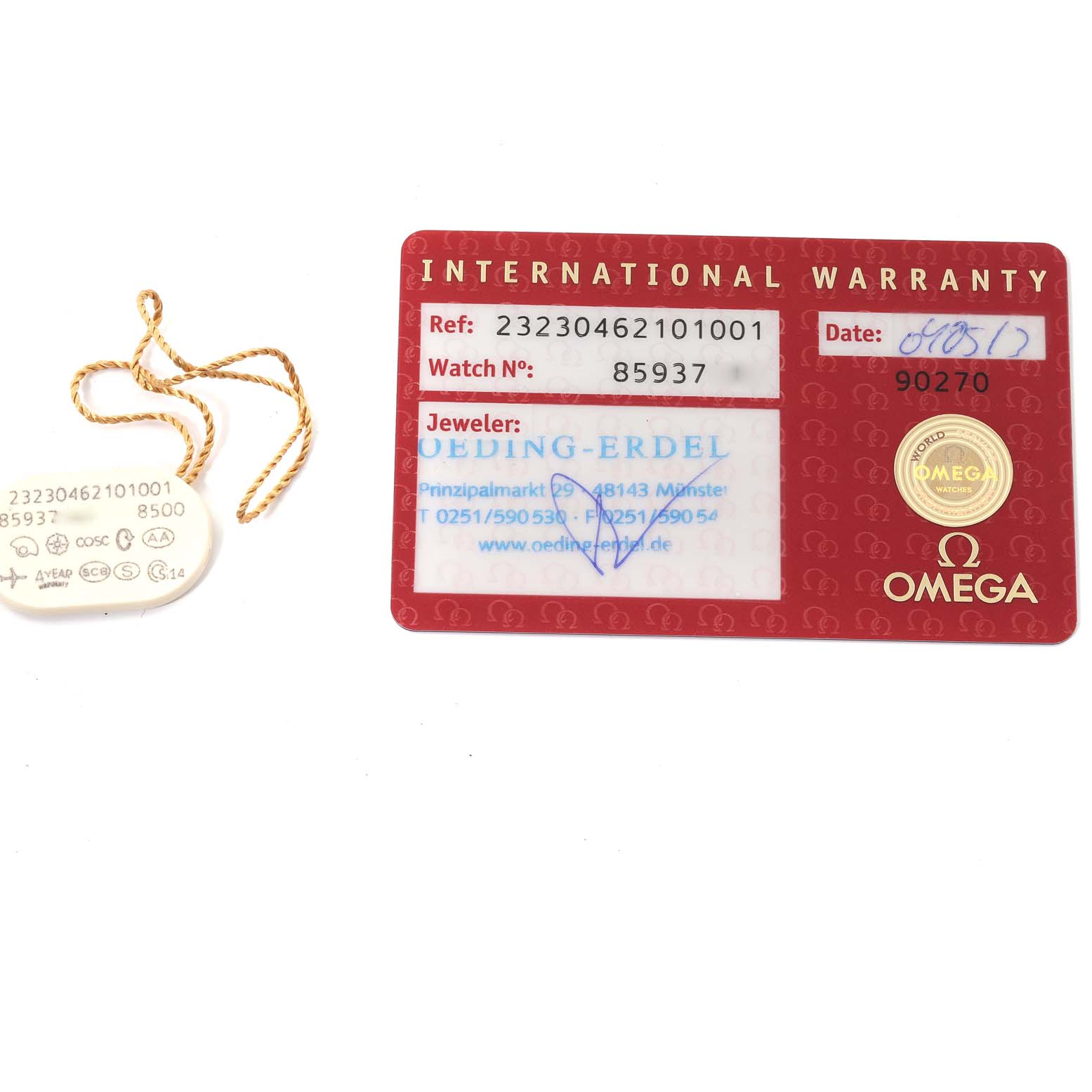 The image shows the Omega Planet Ocean 232.30.46.21.01.001 Men
s Stainless Steel Black Dial 232.30.46.21.01.001 Men
s Stainless Steel Black Dial model
s International Warranty card and a tag with reference and watch numbers.