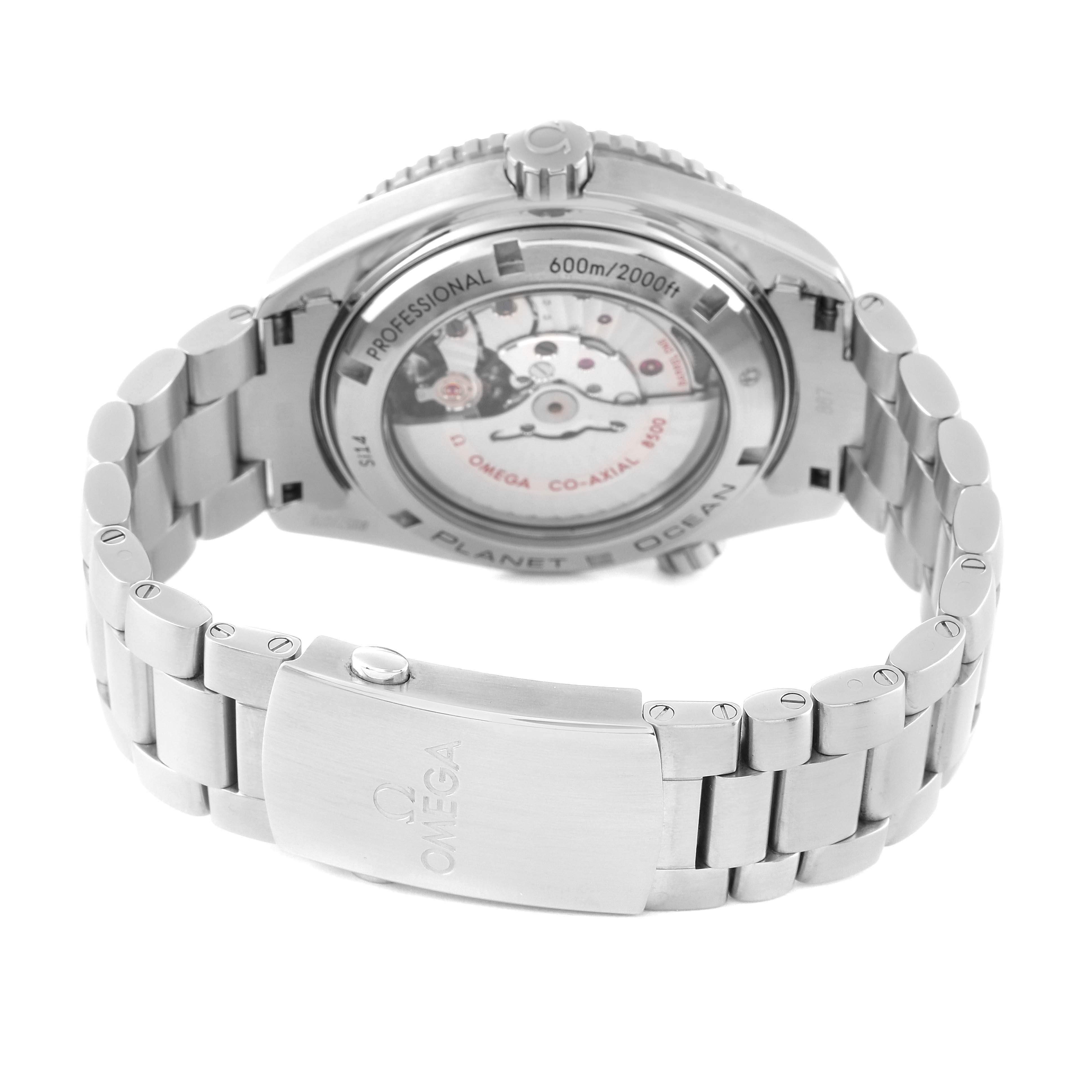 The image shows the back and clasp of the Omega Planet Ocean 232.30.46.21.01.003 Men
s Stainless Steel Black Dial 232.30.46.21.01.003 Men
s Stainless Steel Black Dial watch, highlighting the movement and the metal bracelet.