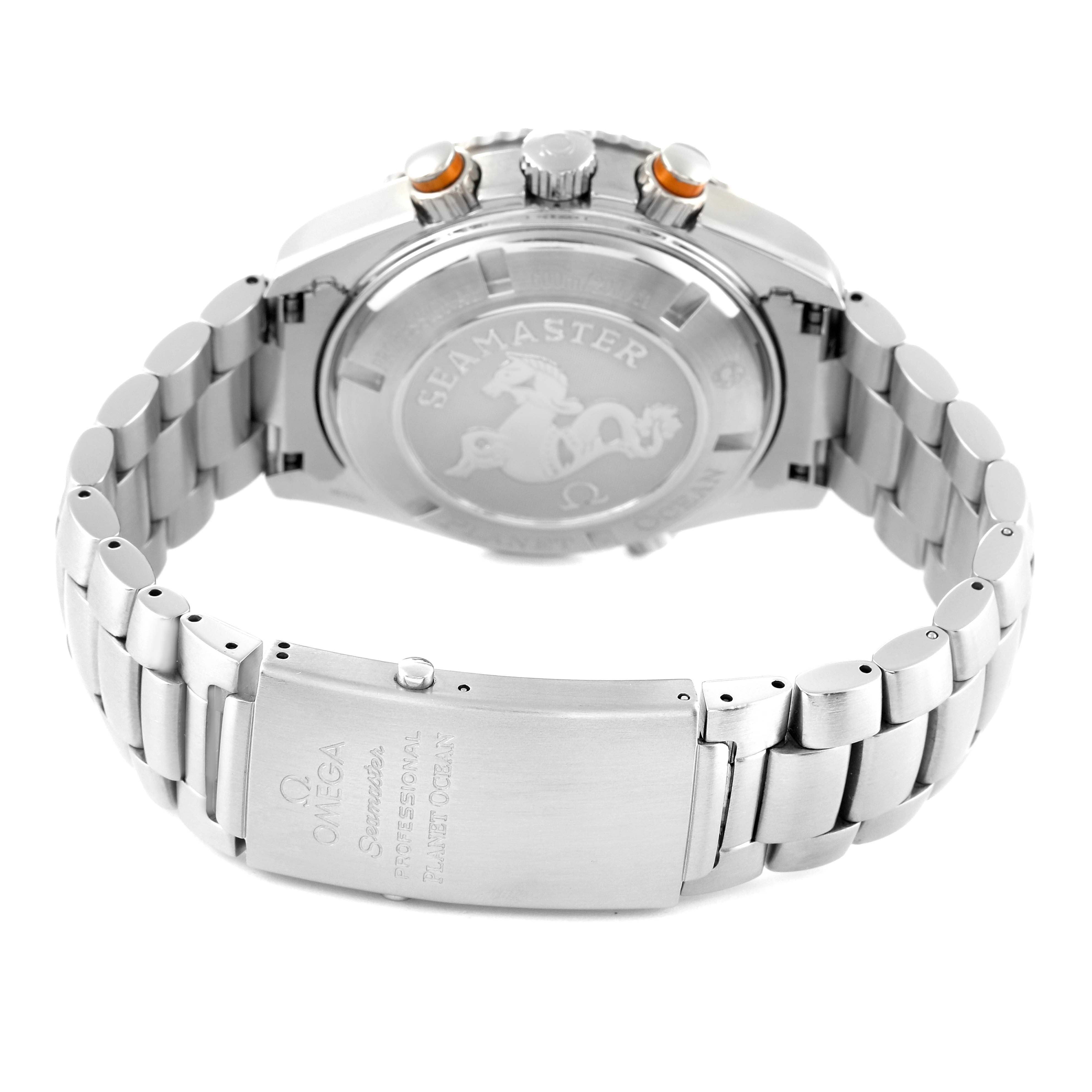 The image shows the back case and metal bracelet of the Omega Planet Ocean 2218.50.00 Men
s Stainless Steel Black Dial 2218.50.00 Men
s Stainless Steel Black Dial watch, highlighting the clasp and engraved back.