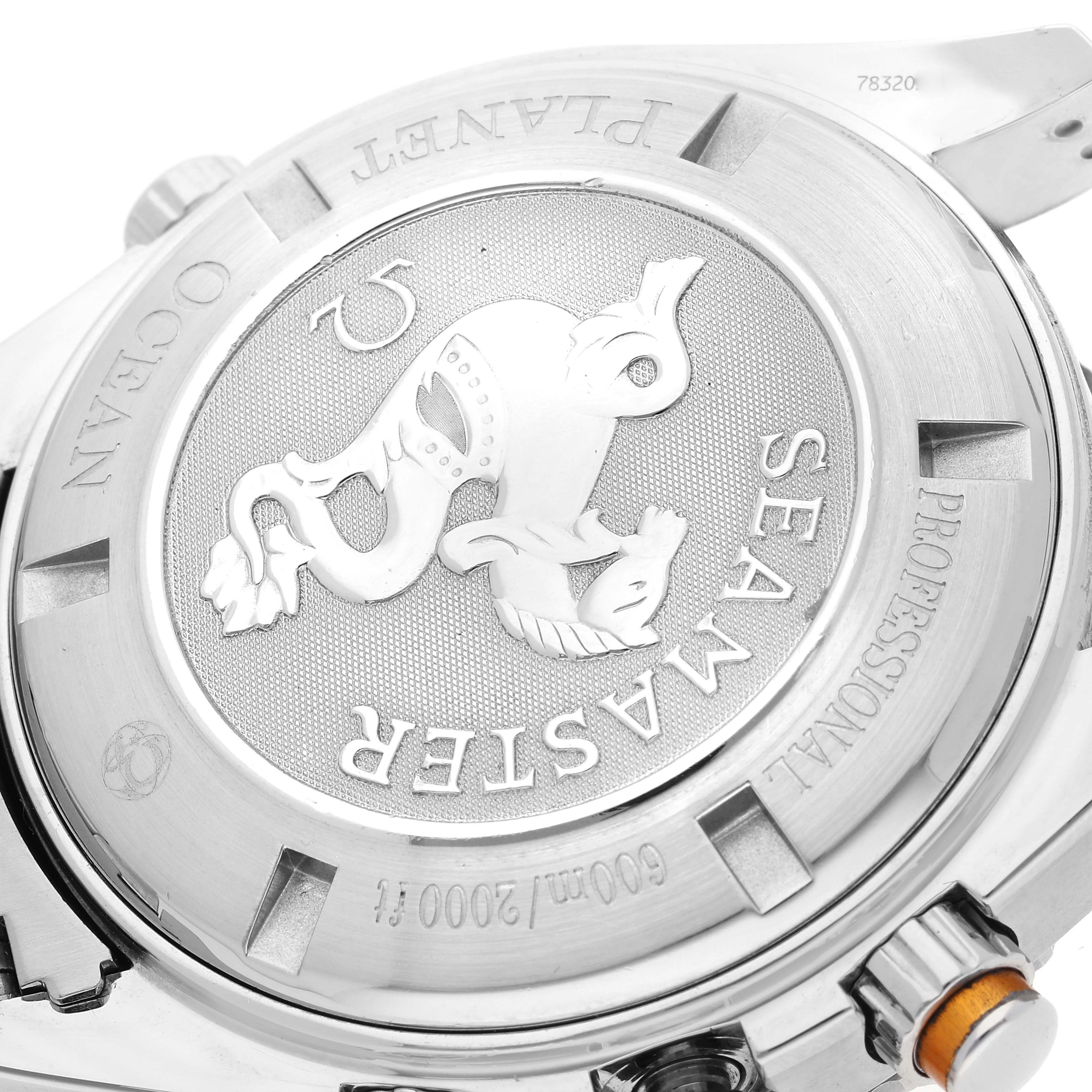 The image shows the case back of an Omega Planet Ocean 2218.50.00 Men
s Stainless Steel Black Dial 2218.50.00 Men
s Stainless Steel Black Dial watch with the Seamaster logo and depth rating engraved.