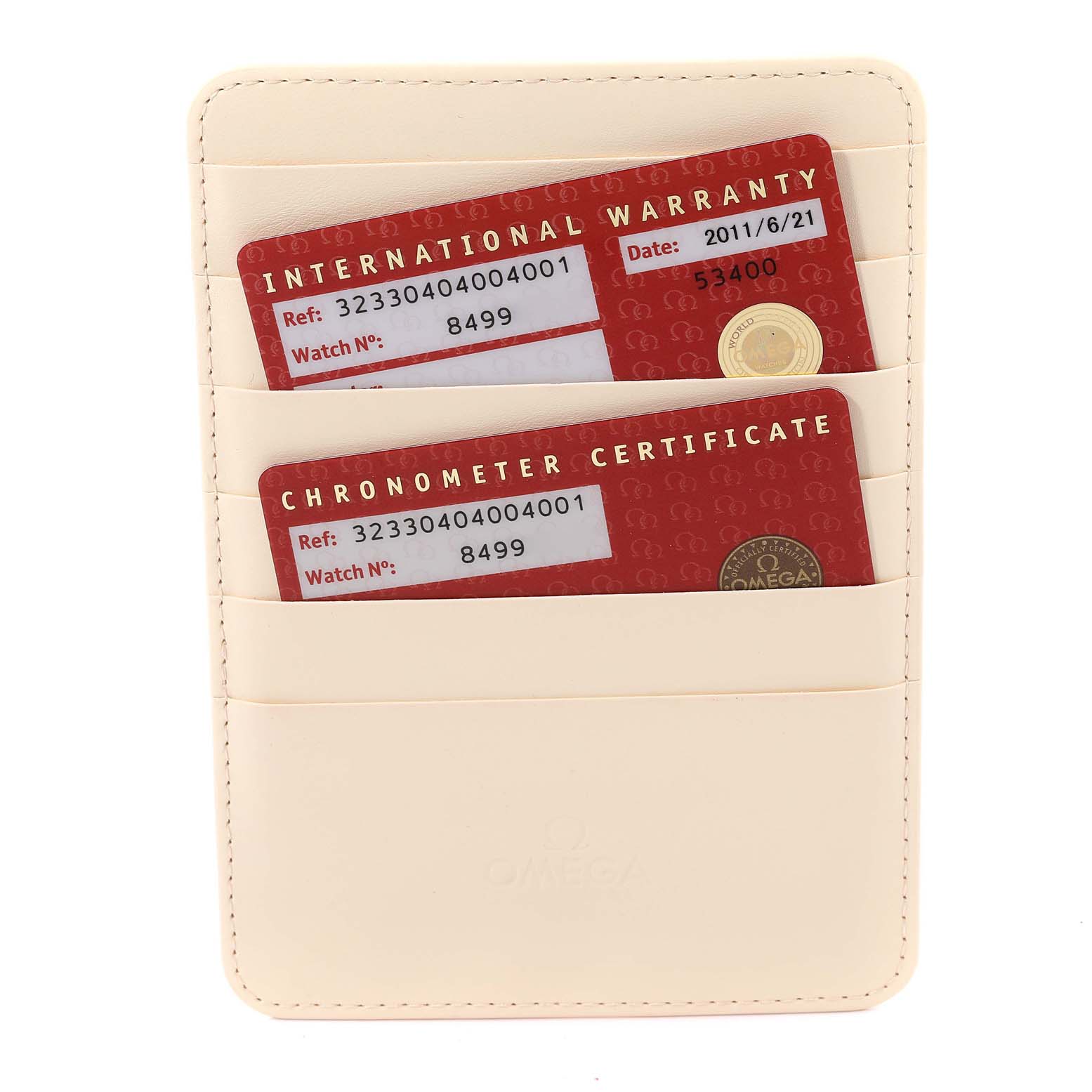This image shows two red Omega Speedmaster 323.30.40.40.04.001 Men's Stainless Steel White Dial 323.30.40.40.04.001 Men's Stainless Steel White Dial cards for international warranty and chronometer certificate in a cream cardholder.