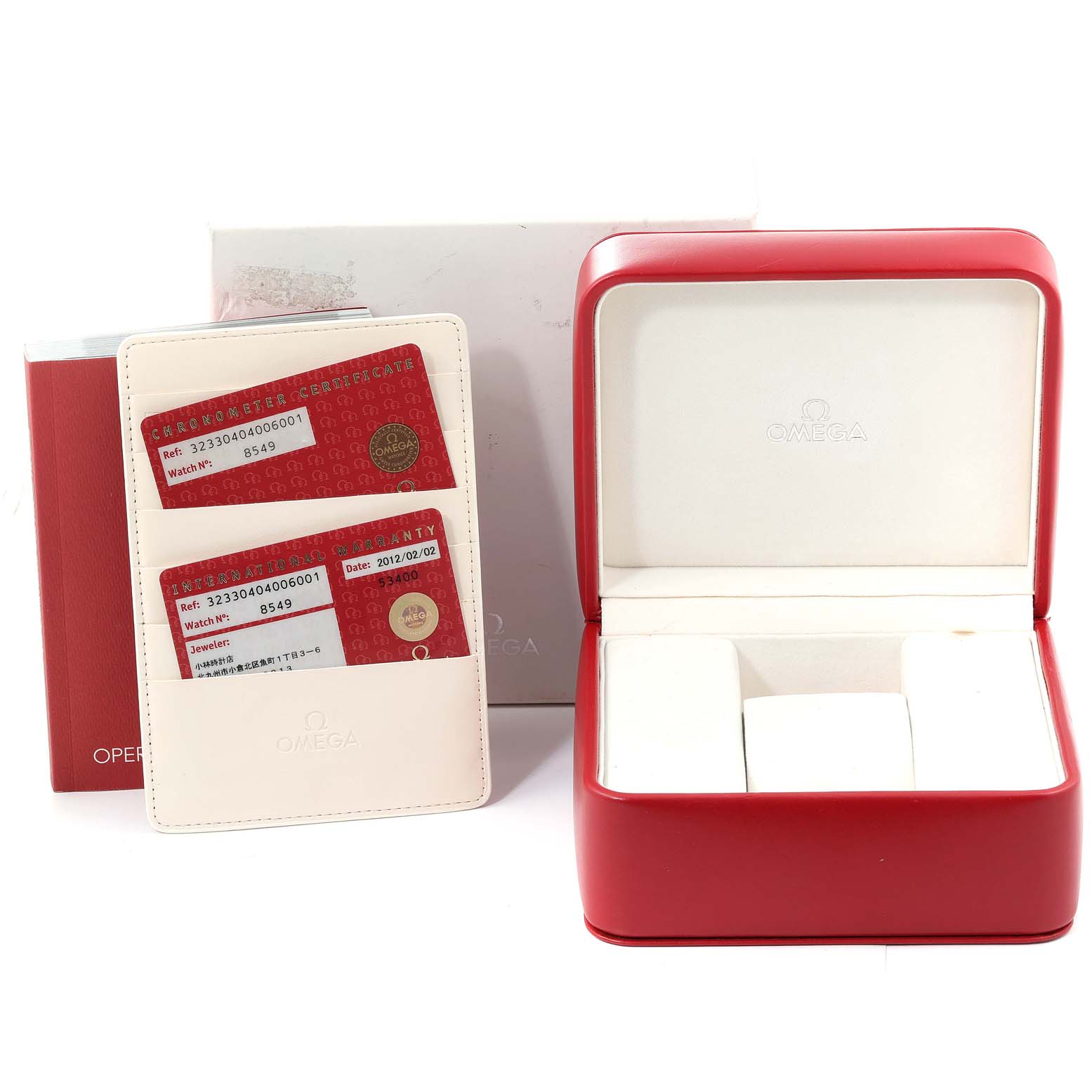 The image shows an open Omega Speedmaster 323.30.40.40.06.001 Men's Stainless Steel Grey Dial 323.30.40.40.06.001 Men's Stainless Steel Grey Dial watch box, warranty cards, and an instruction manual at a front angle.