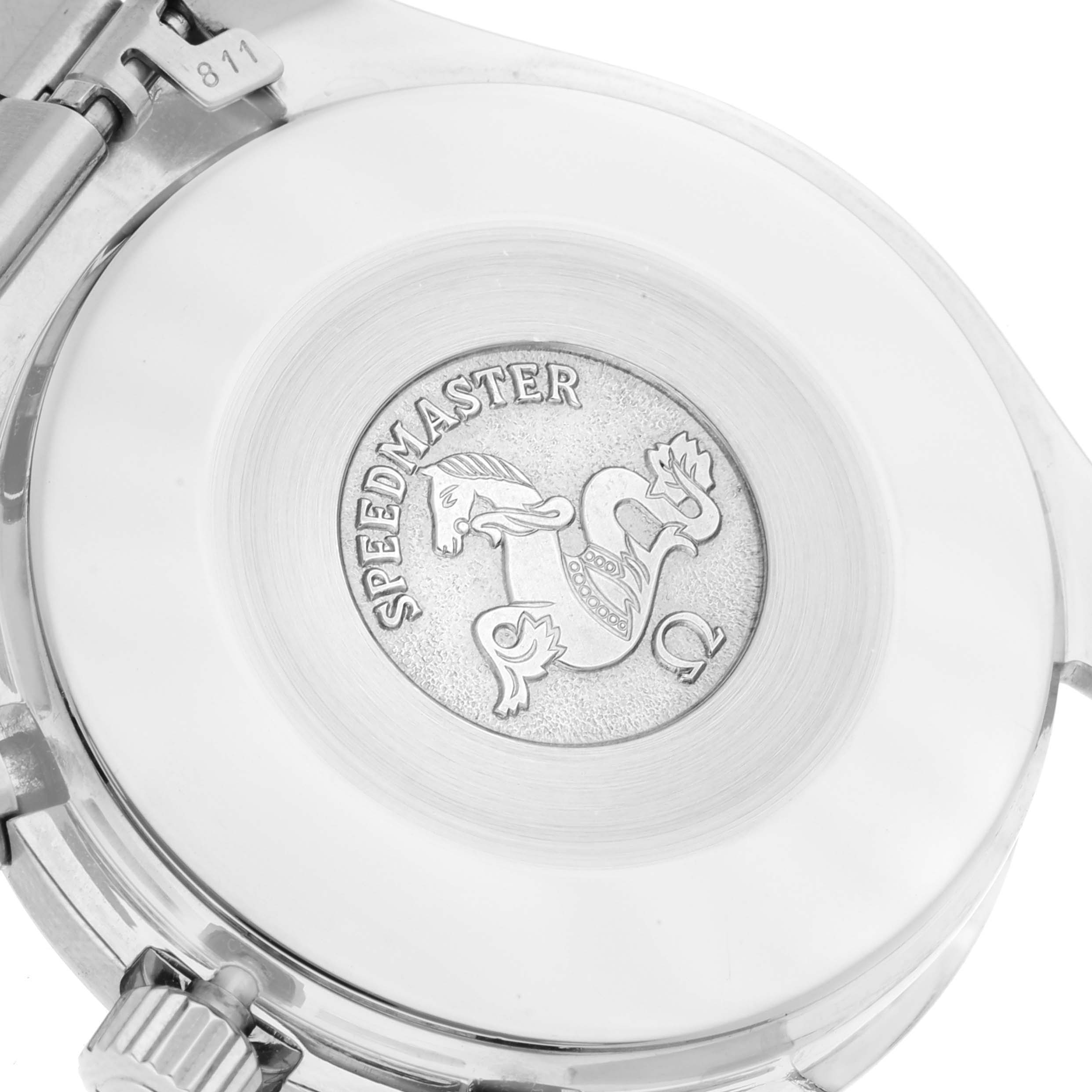 The image shows the back case of an Omega Speedmaster 3510.20.00 Men's Stainless Steel White Dial 3510.20.00 Men's Stainless Steel White Dial watch, featuring its engraved emblem.