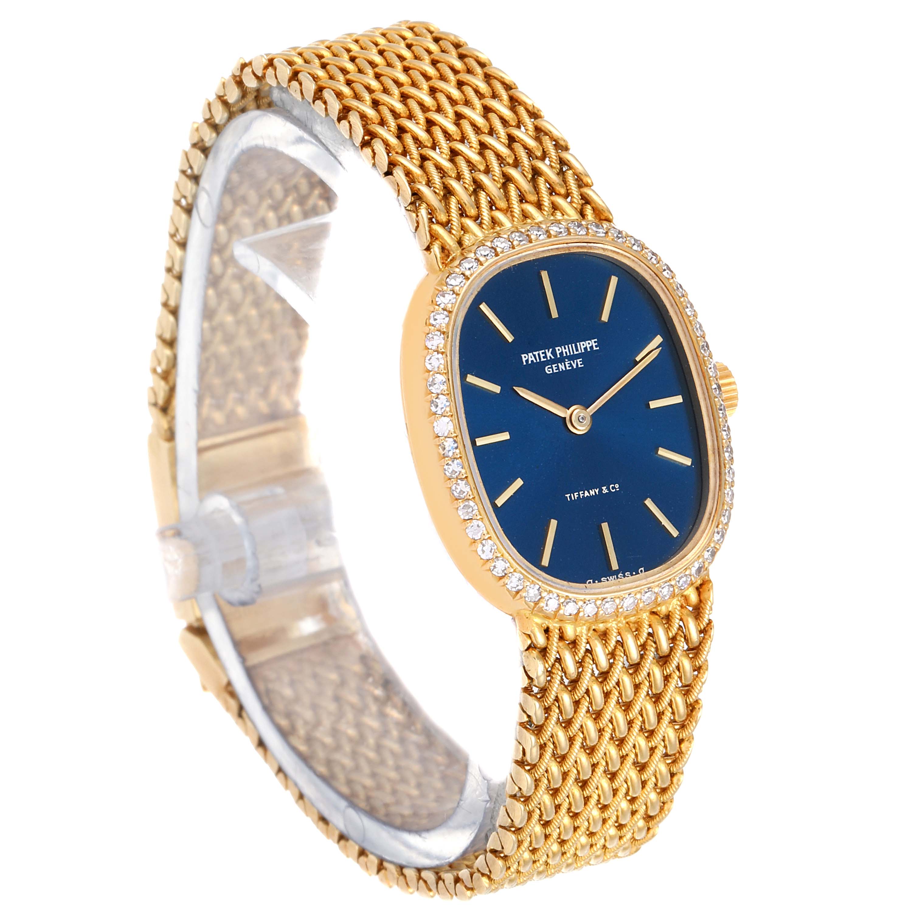 The image shows a side angle of a Patek Philippe Golden Ellipse 4498 Women's Yellow Gold Blue Dial 4498 Women's Yellow Gold Blue Dial watch, highlighting its blue dial, diamond bezel, and gold mesh bracelet.