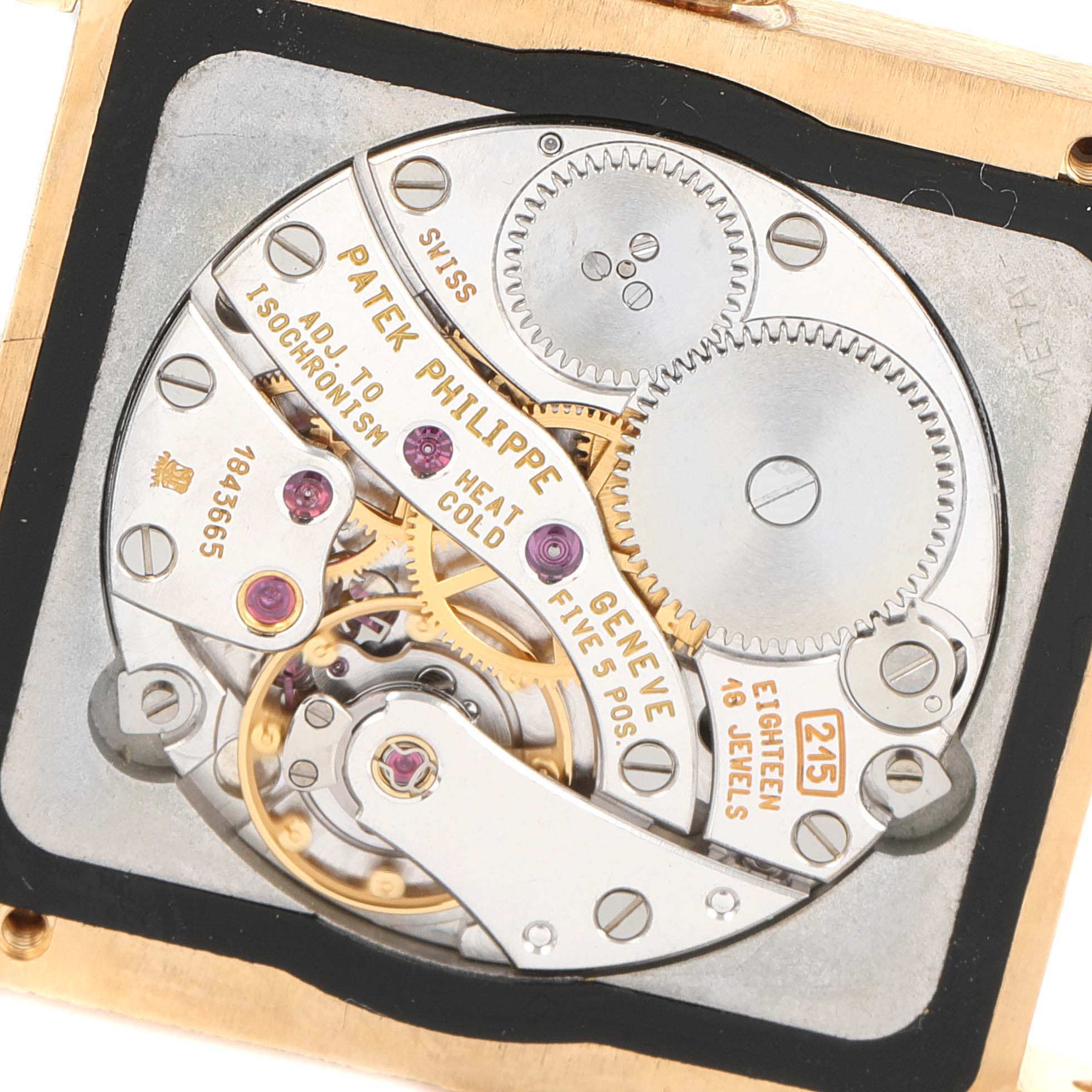 This image shows the detailed inner mechanical movement of a Patek Philippe Gondolo 5014J Men's Yellow Gold White Dial 5014J Men's Yellow Gold White Dial watch from an overhead angle.