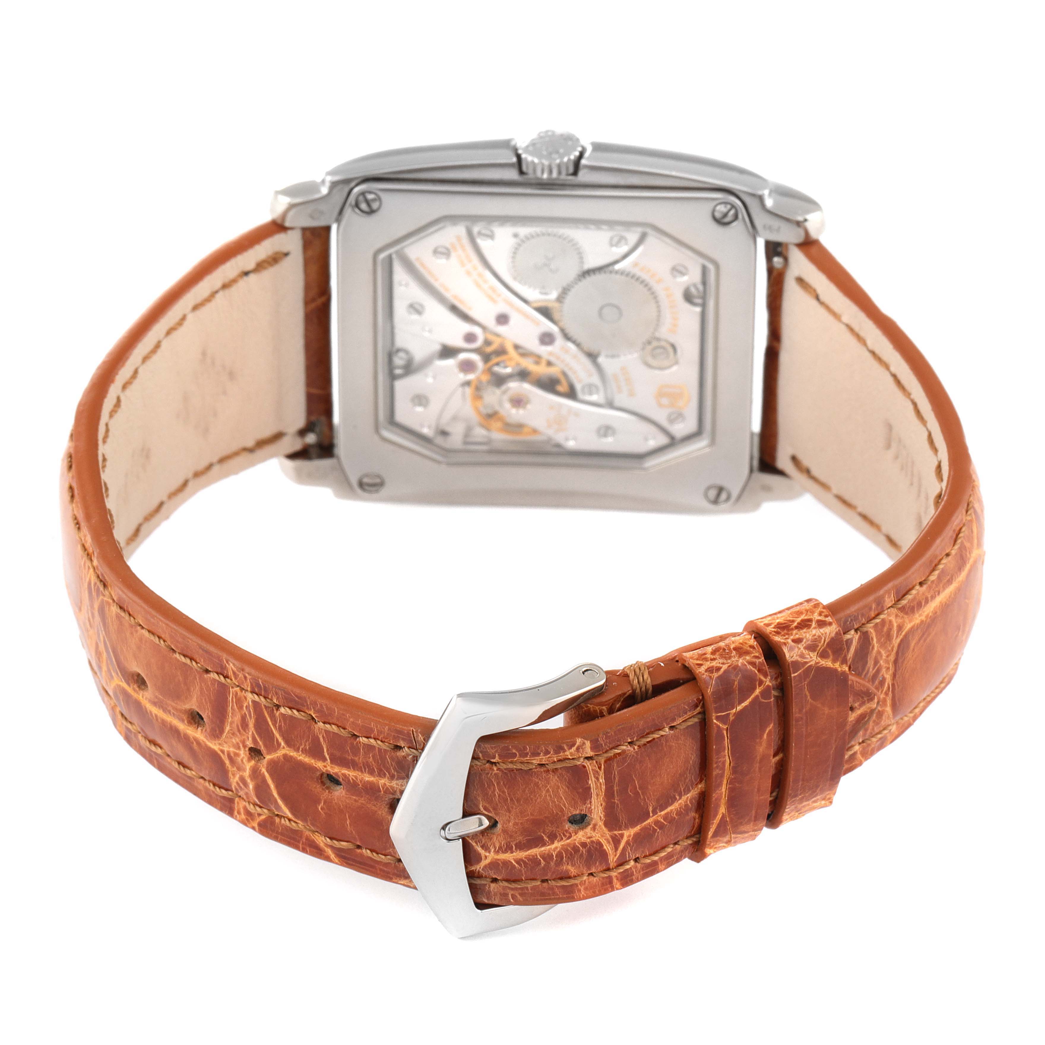 The image shows the back view of the Patek Philippe Gondolo 5124G-001 Men's White Gold Pink Dial 5124G-001 Men's White Gold Pink Dial watch, highlighting the movement and leather strap.