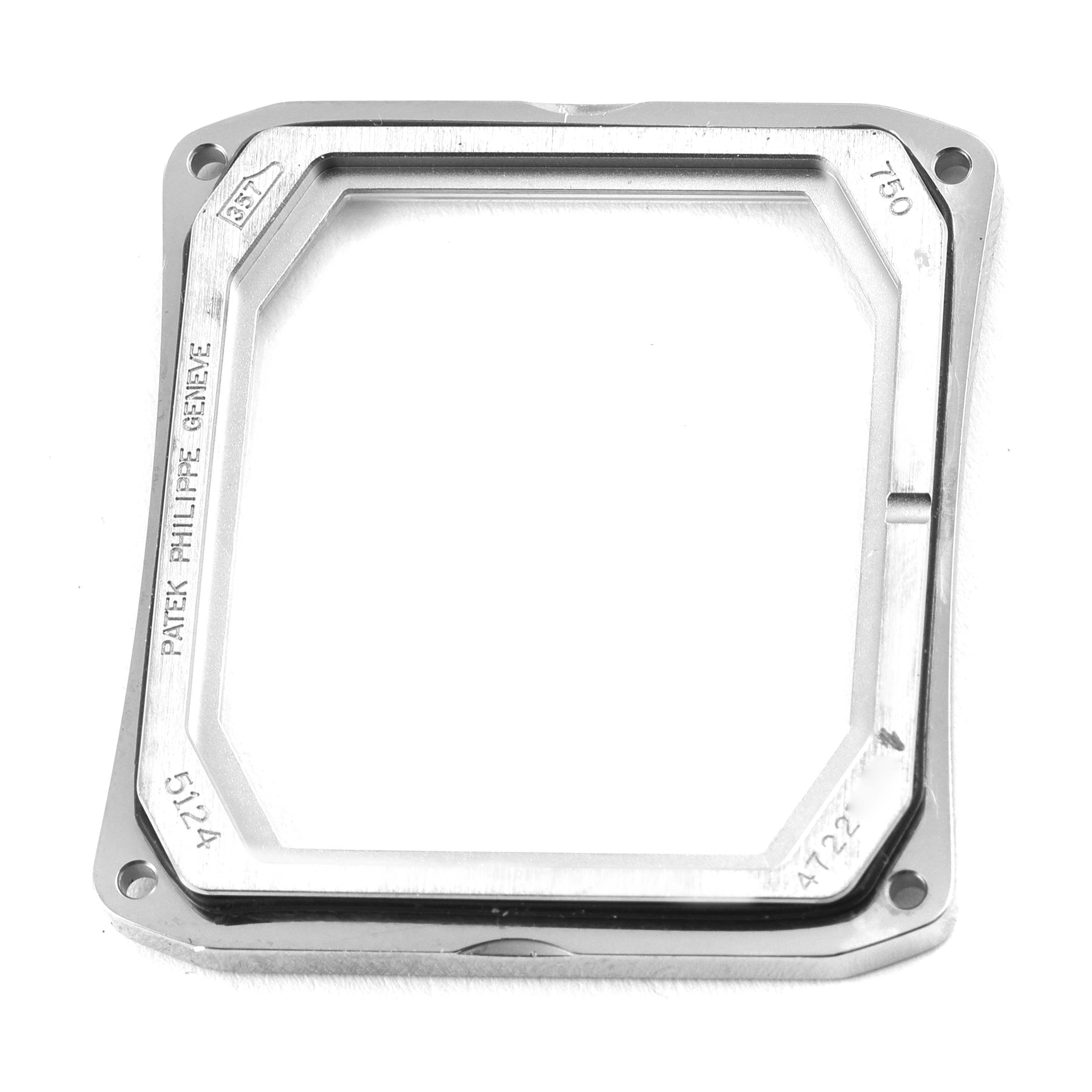 This image shows a front view of the metal case frame for a Patek Philippe Gondolo 5124G-001 Men's White Gold Pink Dial 5124G-001 Men's White Gold Pink Dial watch.