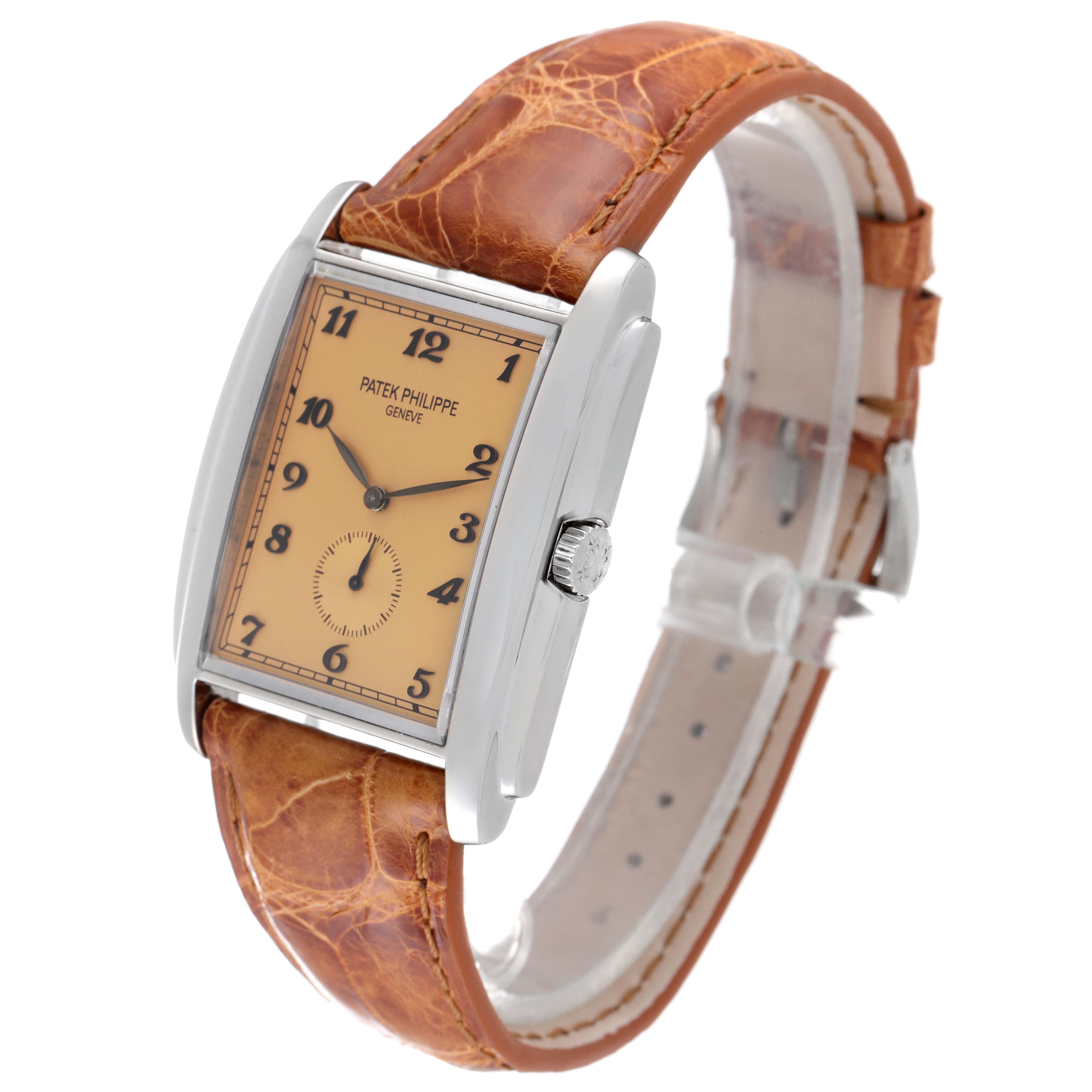 The Patek Philippe Gondolo 5124G-001 Men's White Gold Pink Dial 5124G-001 Men's White Gold Pink Dial watch is shown at a front-left angle, displaying its face, crown, and leather strap.