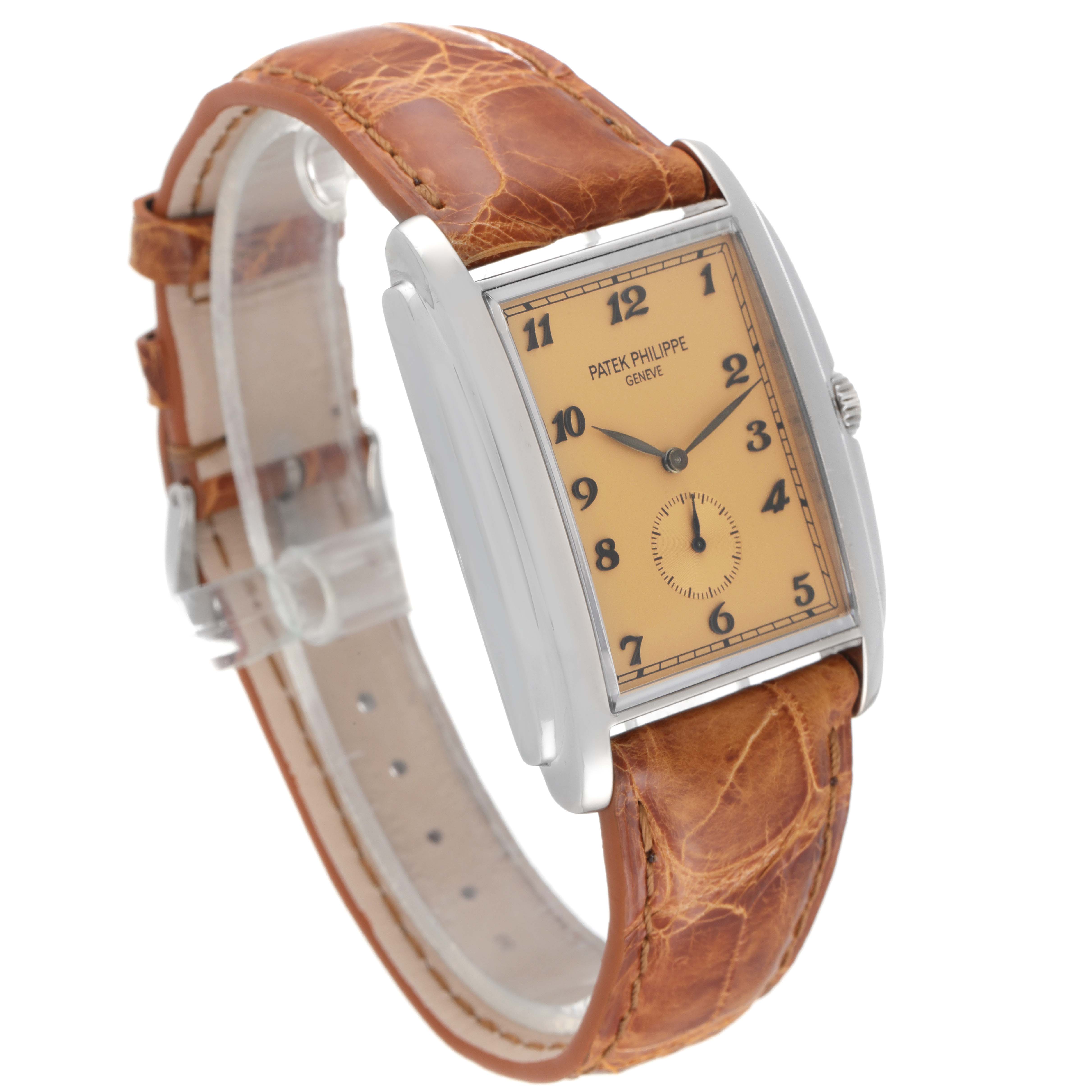 This image shows the Patek Philippe Gondolo 5124G-001 Men's White Gold Pink Dial 5124G-001 Men's White Gold Pink Dial watch from a three-quarter angle, displaying the face, case, and brown leather strap.