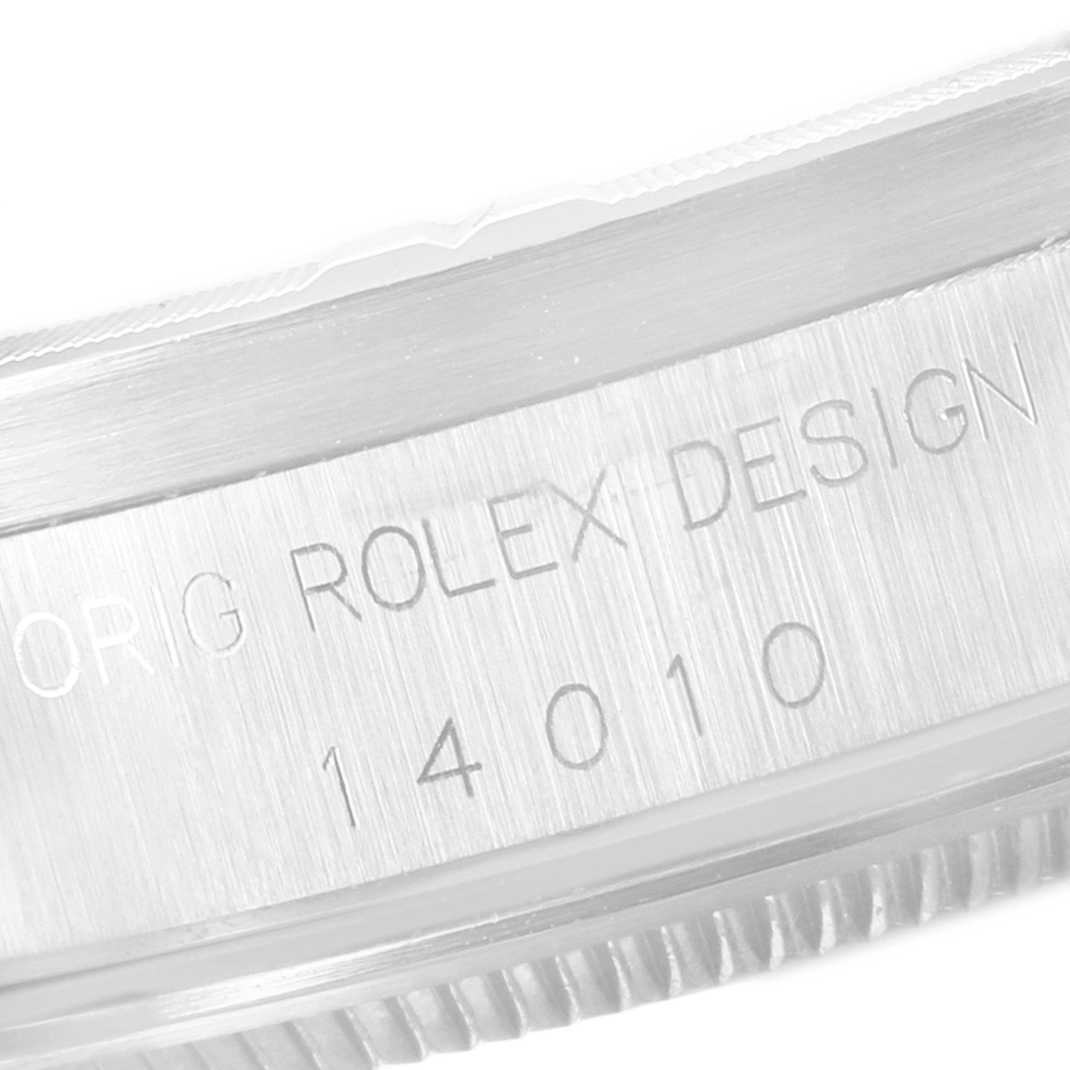 This is a close-up of the engraved text on the case side of a Rolex Air-King 14010 Men's Stainless Steel White Dial 14010 Men's Stainless Steel White Dial watch.