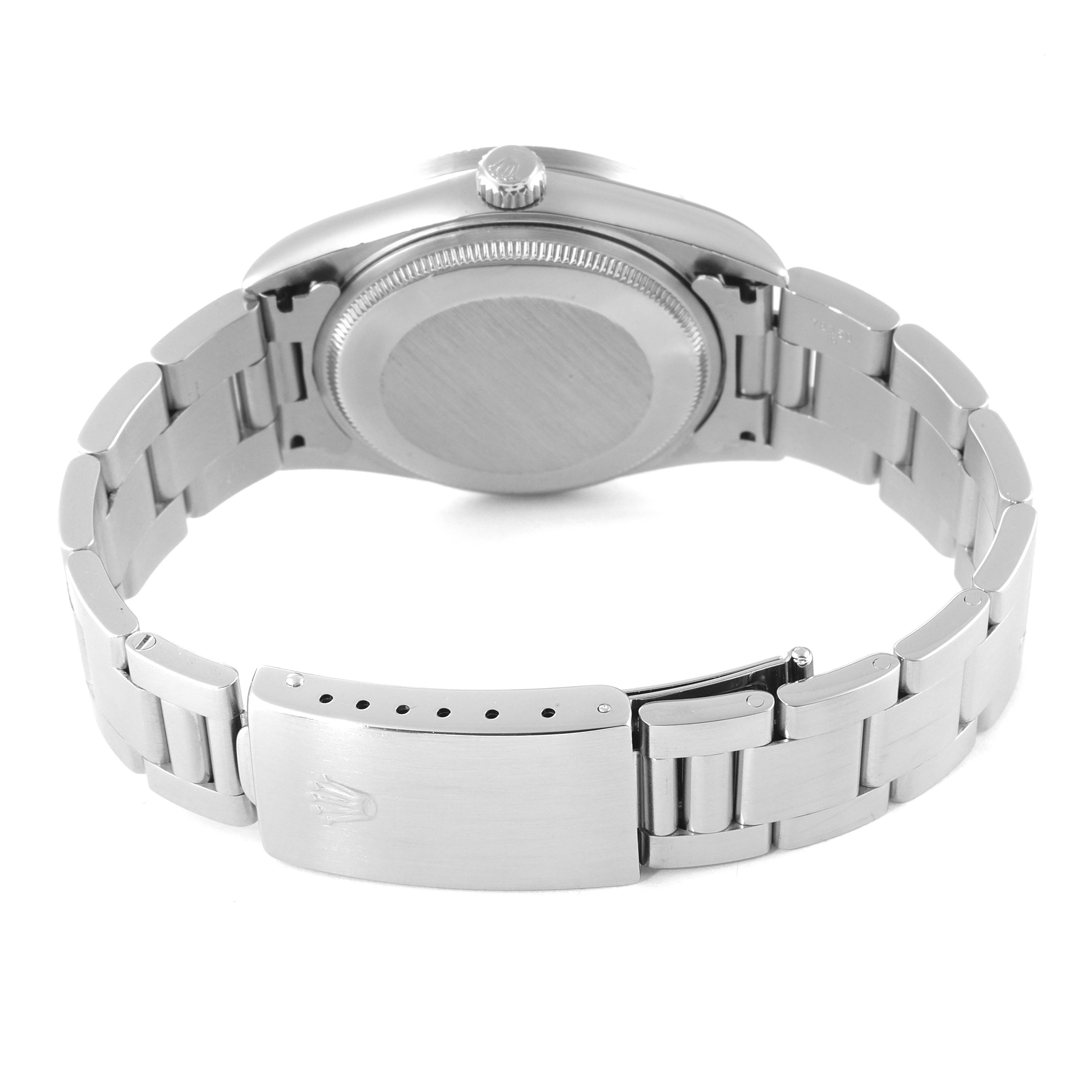 The image shows the back view of a Rolex Air-King 14010 Men's Stainless Steel White Dial 14010 Men's Stainless Steel White Dial watch, highlighting the case back and bracelet with clasp.
