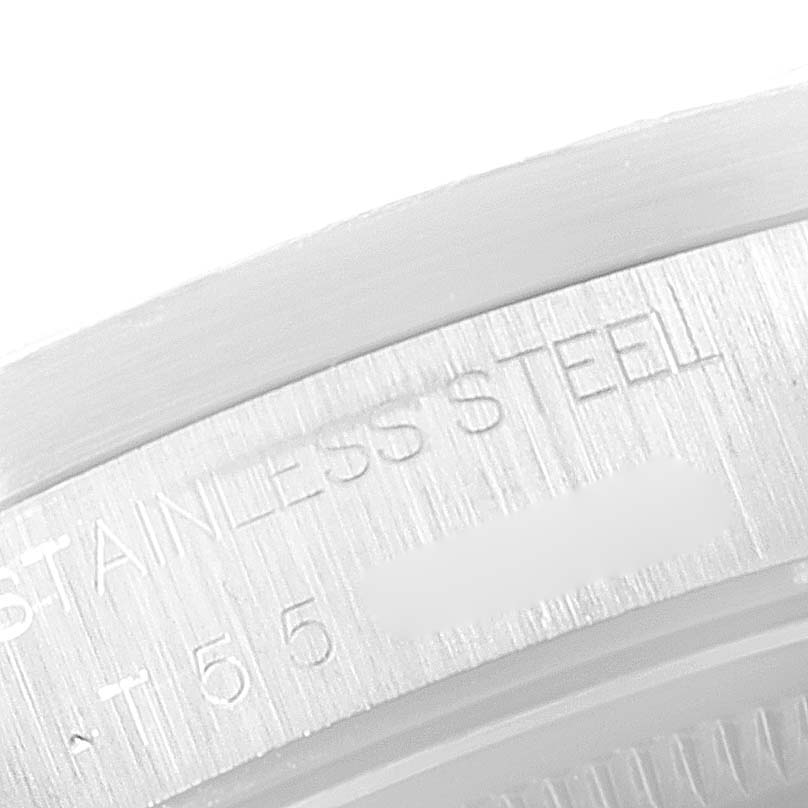 This image shows a close-up of the stainless steel case back of a Rolex Air-King 14010 Men's Stainless Steel White Dial 14010 Men's Stainless Steel White Dial watch.