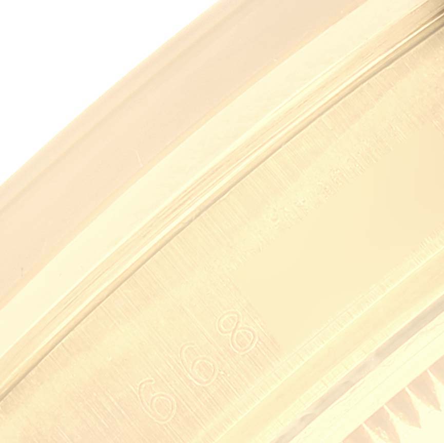 The image shows a close-up view of the inner side of the bezel or case back of the Rolex Vintage Collection 15007 Men's Yellow Gold Champagne Dial 15007 Men's Yellow Gold Champagne Dial watch.