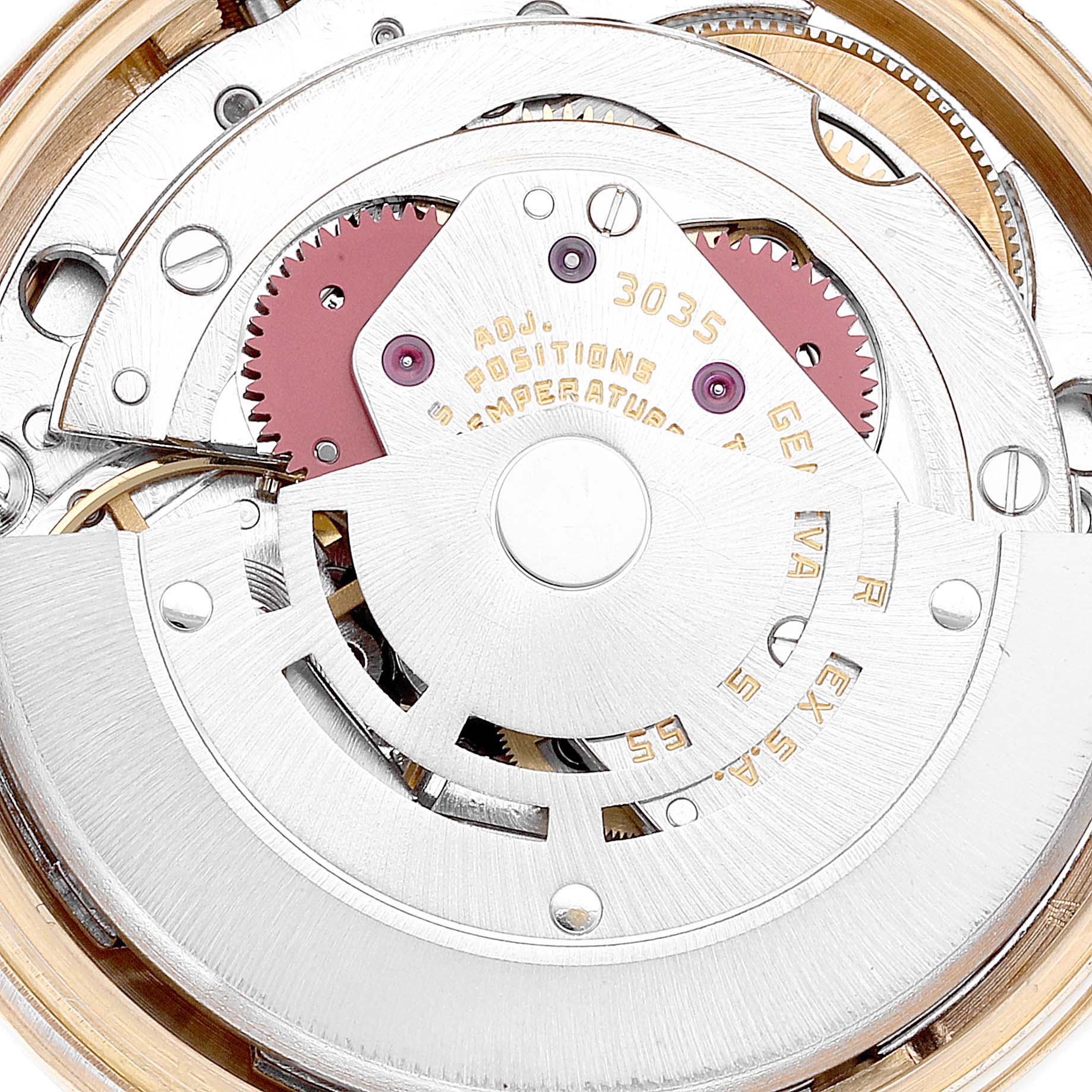 The image displays the intricate internal mechanism of a Vintage Collection Rolex watch, focusing on its gears and movement parts.