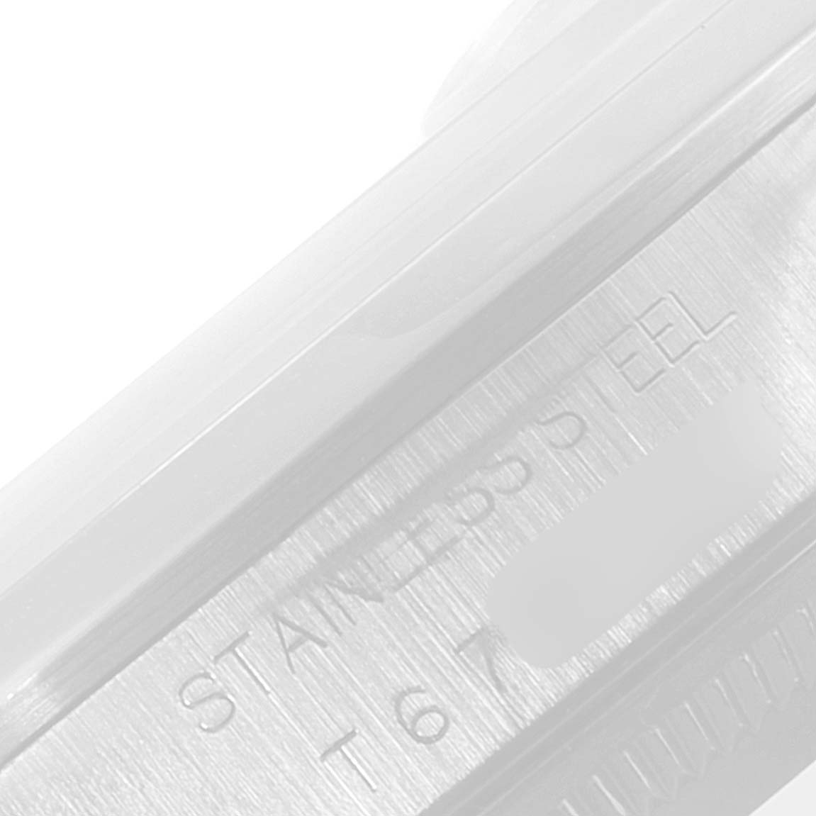 The image shows a close-up angle of the Rolex Date 15200 Men's Stainless Steel Silver Dial 15200 Men's Stainless Steel Silver Dial model, highlighting its stainless steel case with engraved text.