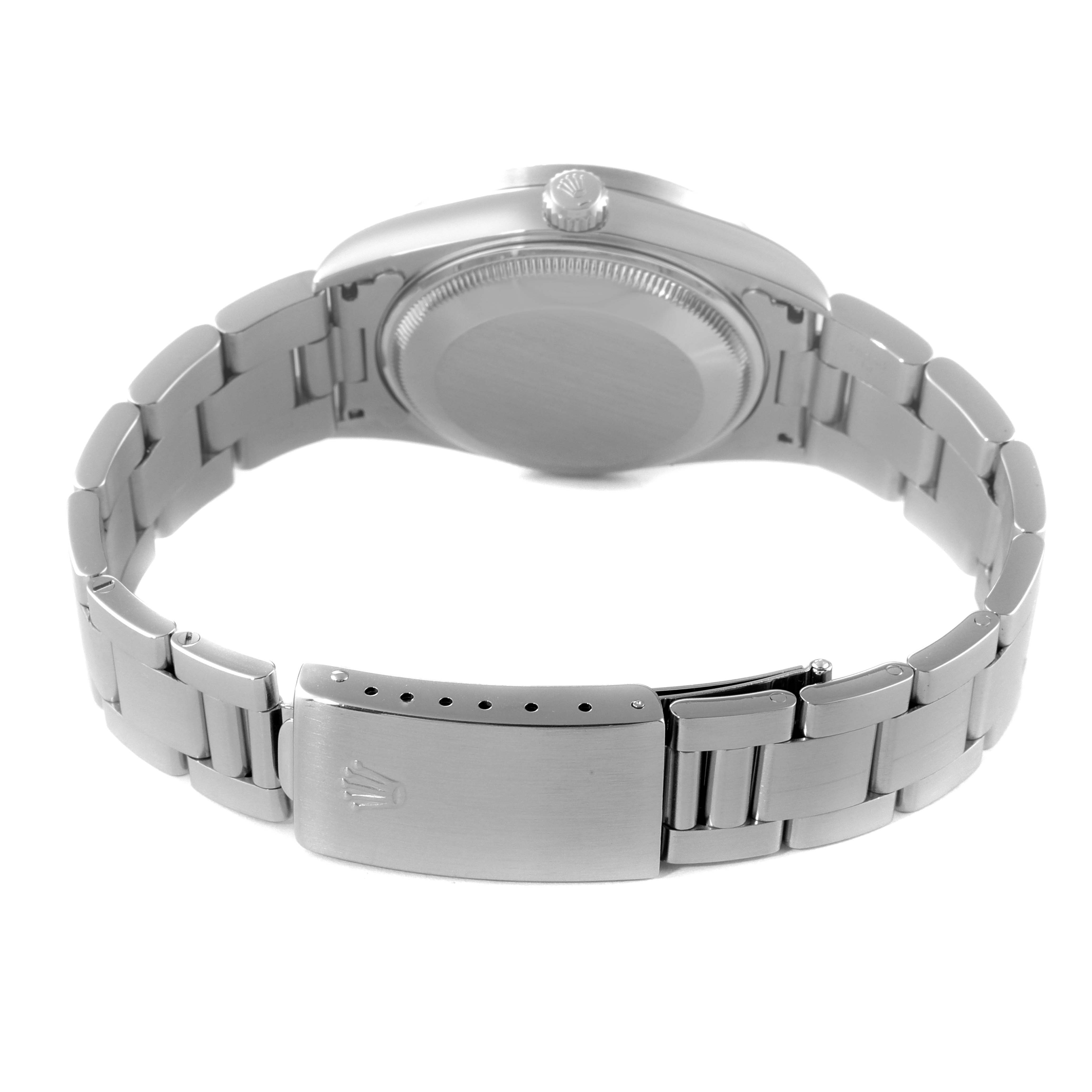 This image shows the back case, crown, and bracelet (with the clasp closed) of a Rolex Date 15210 Men's Stainless Steel Silver Dial 15210 Men's Stainless Steel Silver Dial model watch.