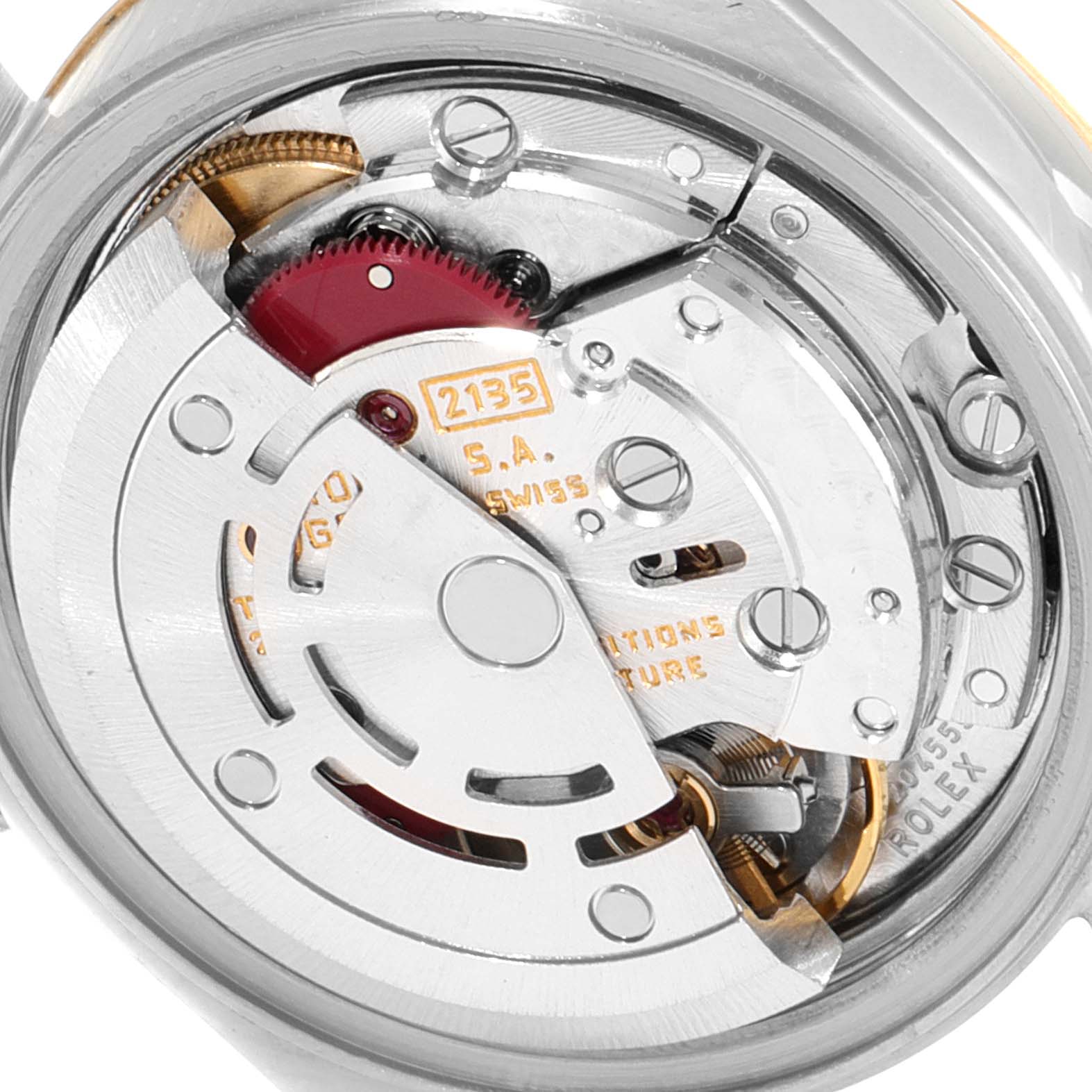 The image shows a close-up view of the movement mechanism of a Rolex Datejust 69173 Women
s Steel and Gold (two tone) Silver Dial 69173 Women
s Steel and Gold (two tone) Silver Dial watch.