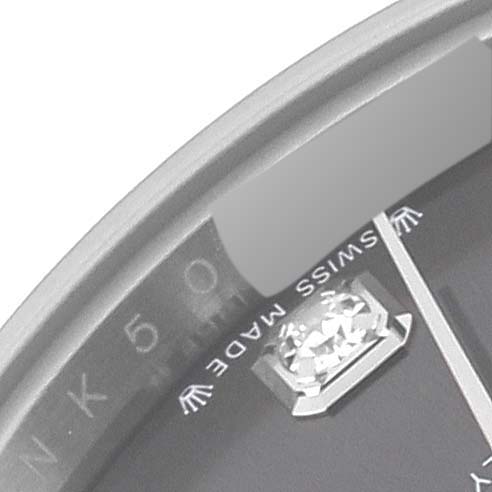 This close-up angle shows a partial view of the dial and markers of a Rolex Datejust 279174 Women's Stainless Steel Grey Dial 279174 Women's Stainless Steel Grey Dial watch, highlighting the "SWISS MADE" text and a diamond hour marker.